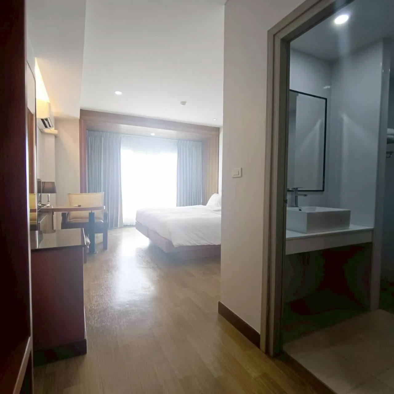 Bed in Cozy Donmueang Hotel