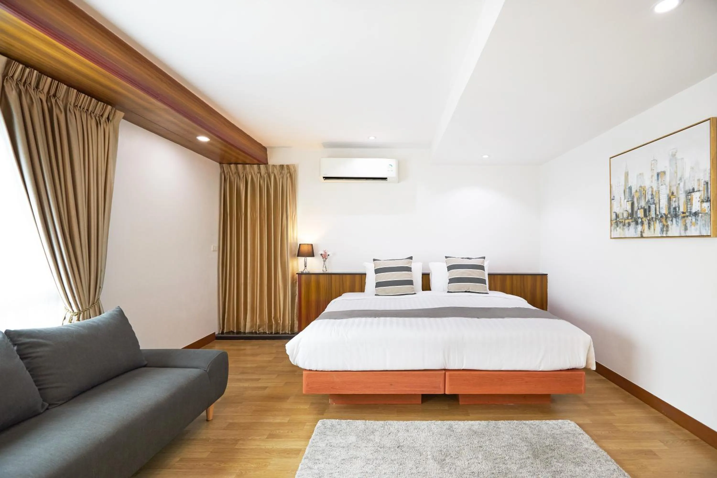 Bed in NJOY Prestige Grand Hotel Don Mueang