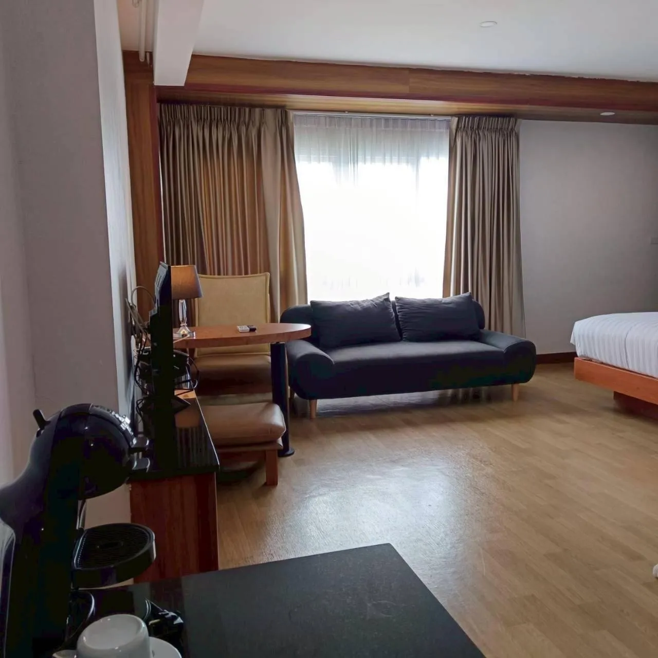 Bed in Cozy Donmueang Hotel