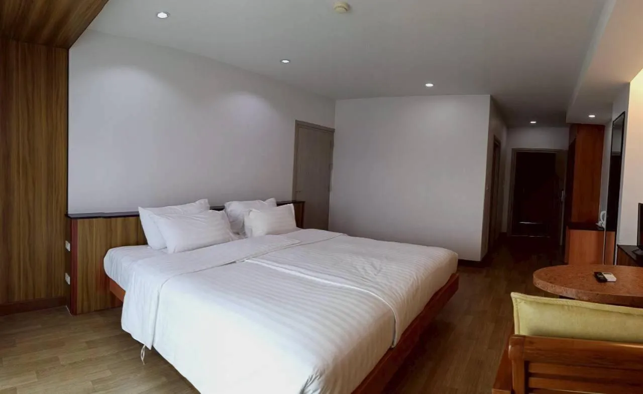 Bed in Cozy Donmueang Hotel