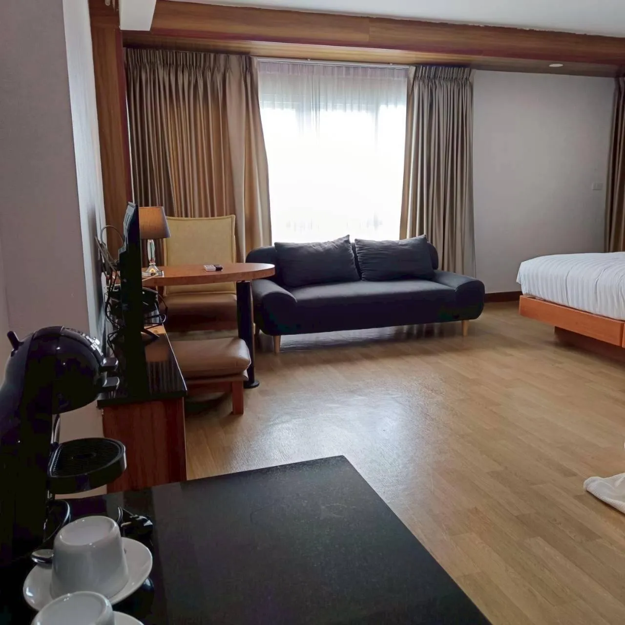 Bed in Cozy Donmueang Hotel