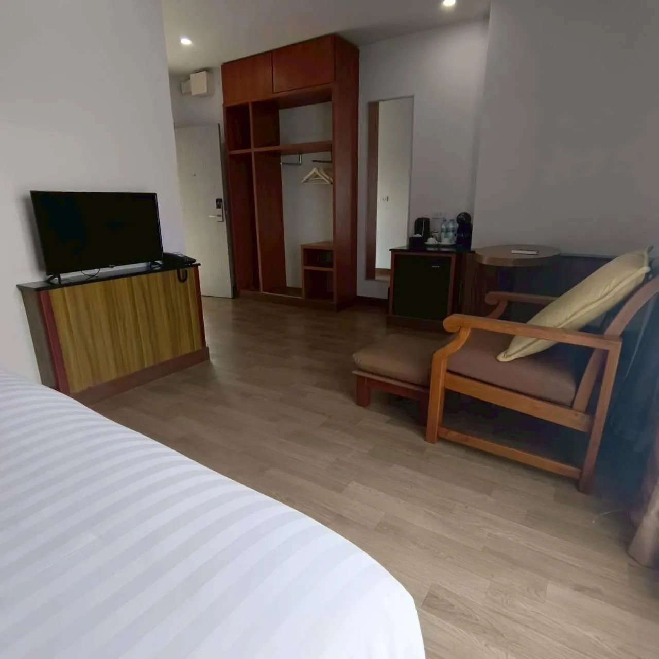 Bed in Cozy Donmueang Hotel