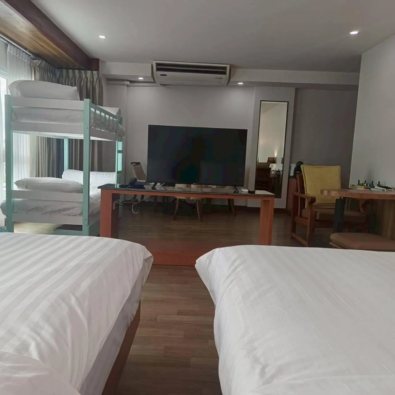 Bed in Cozy Donmueang Hotel