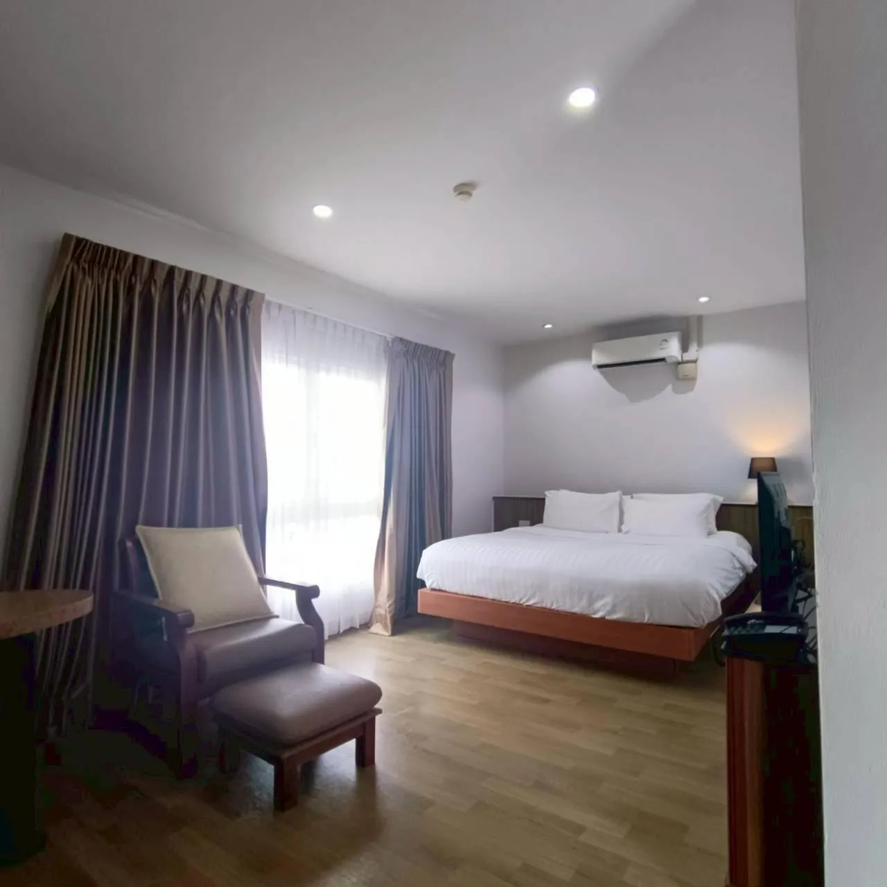 Bed in Cozy Donmueang Hotel