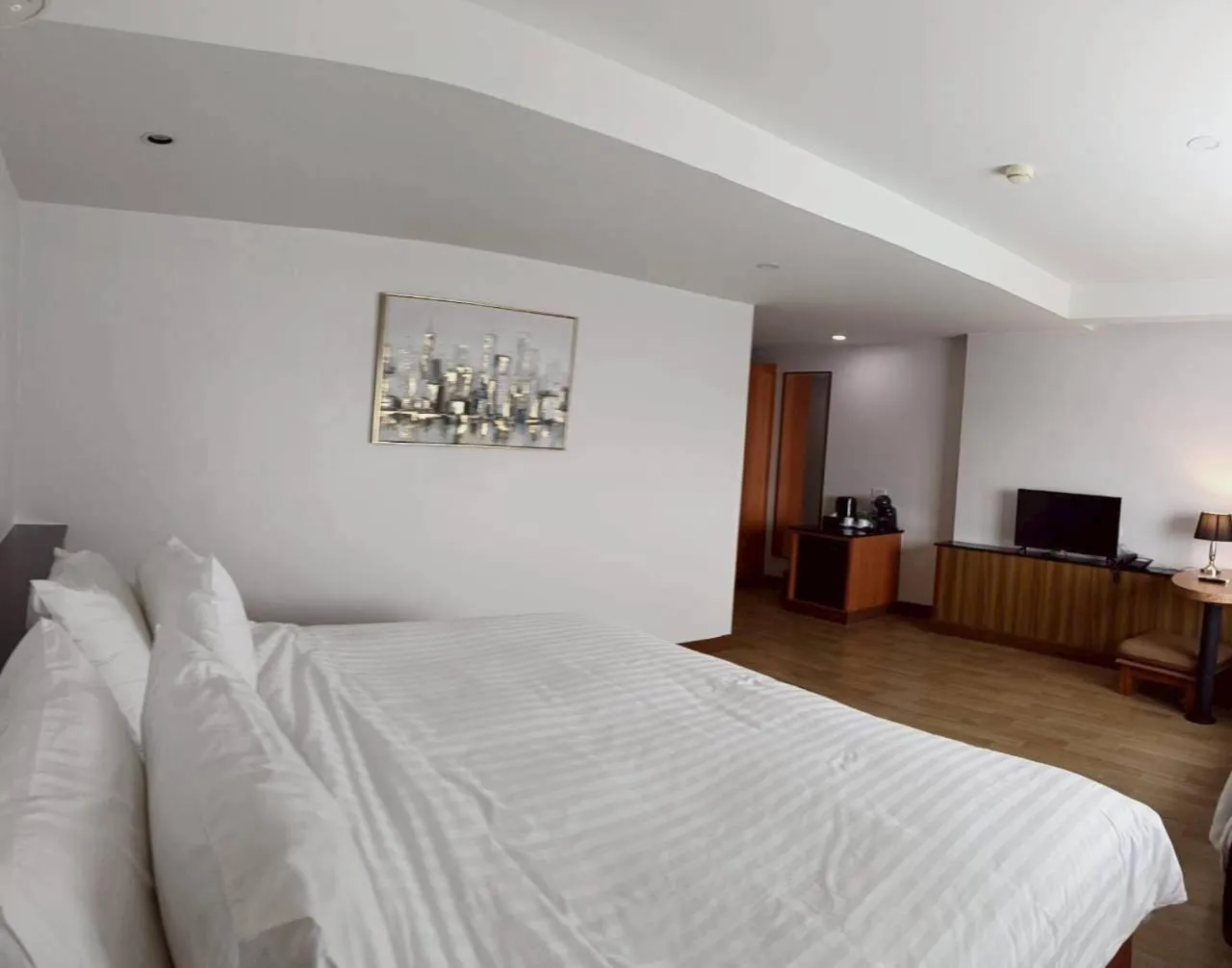 Bed in Cozy Donmueang Hotel