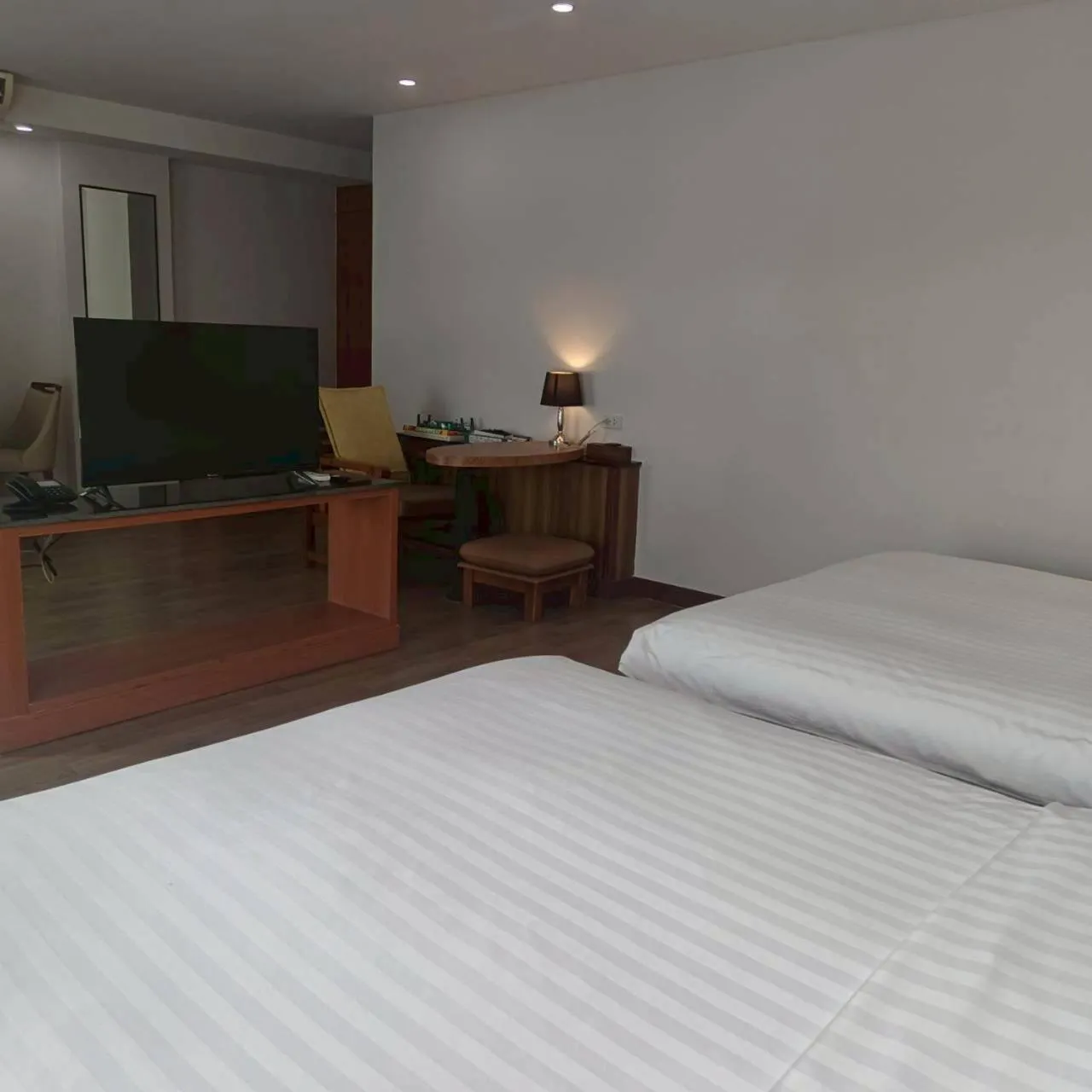 Bed in Cozy Donmueang Hotel