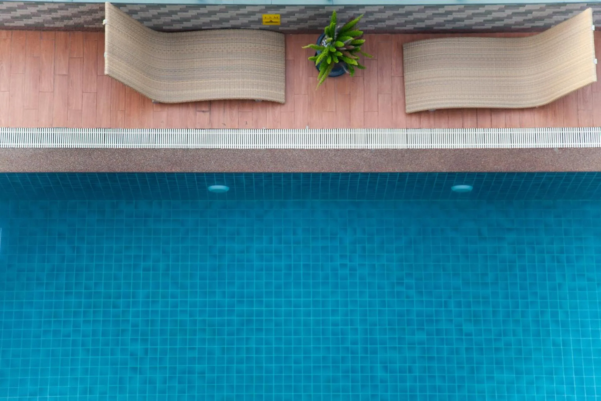 Swimming pool in NJOY Prestige Grand Hotel Don Mueang