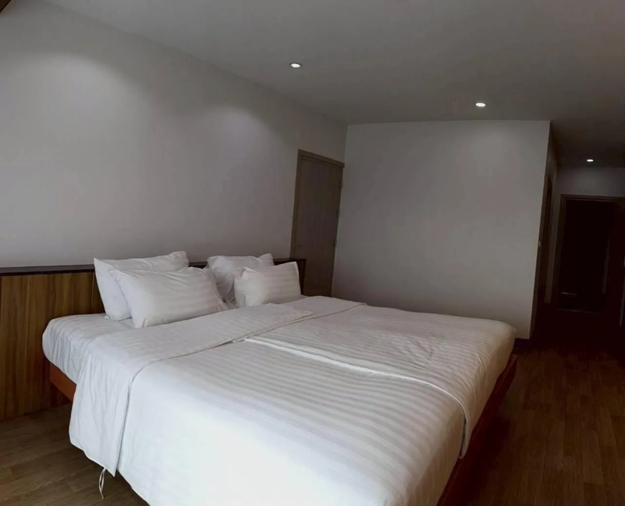 Bed in Cozy Donmueang Hotel