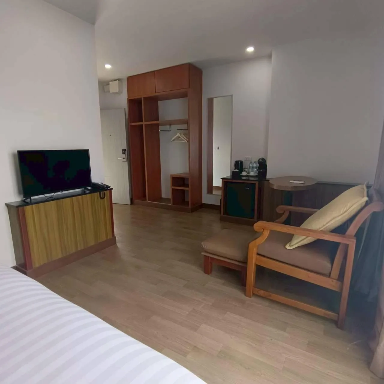 Bed in Cozy Donmueang Hotel