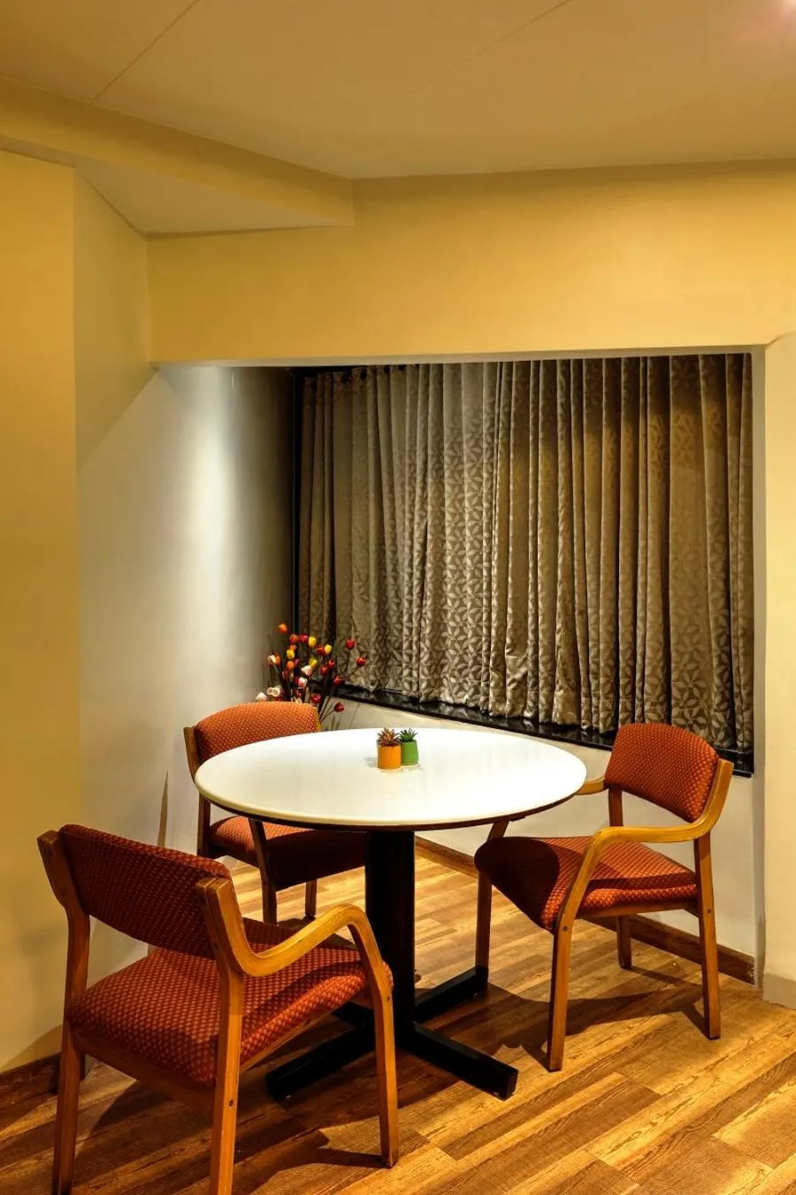 Seating area in Hotel Orient Crown, Kolhapur