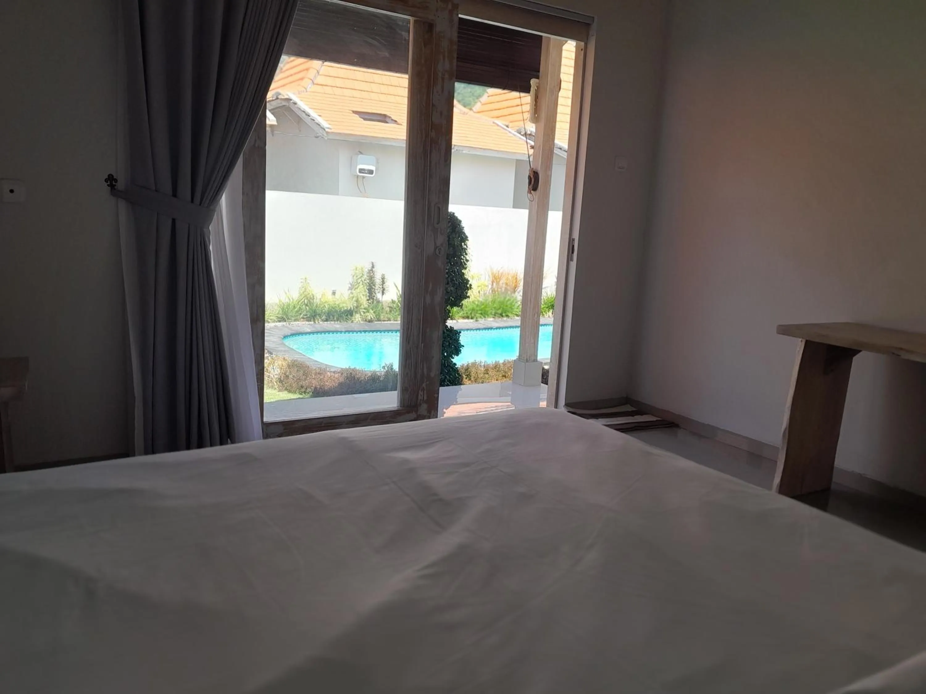 Bed in Maha Rama Villas Amed