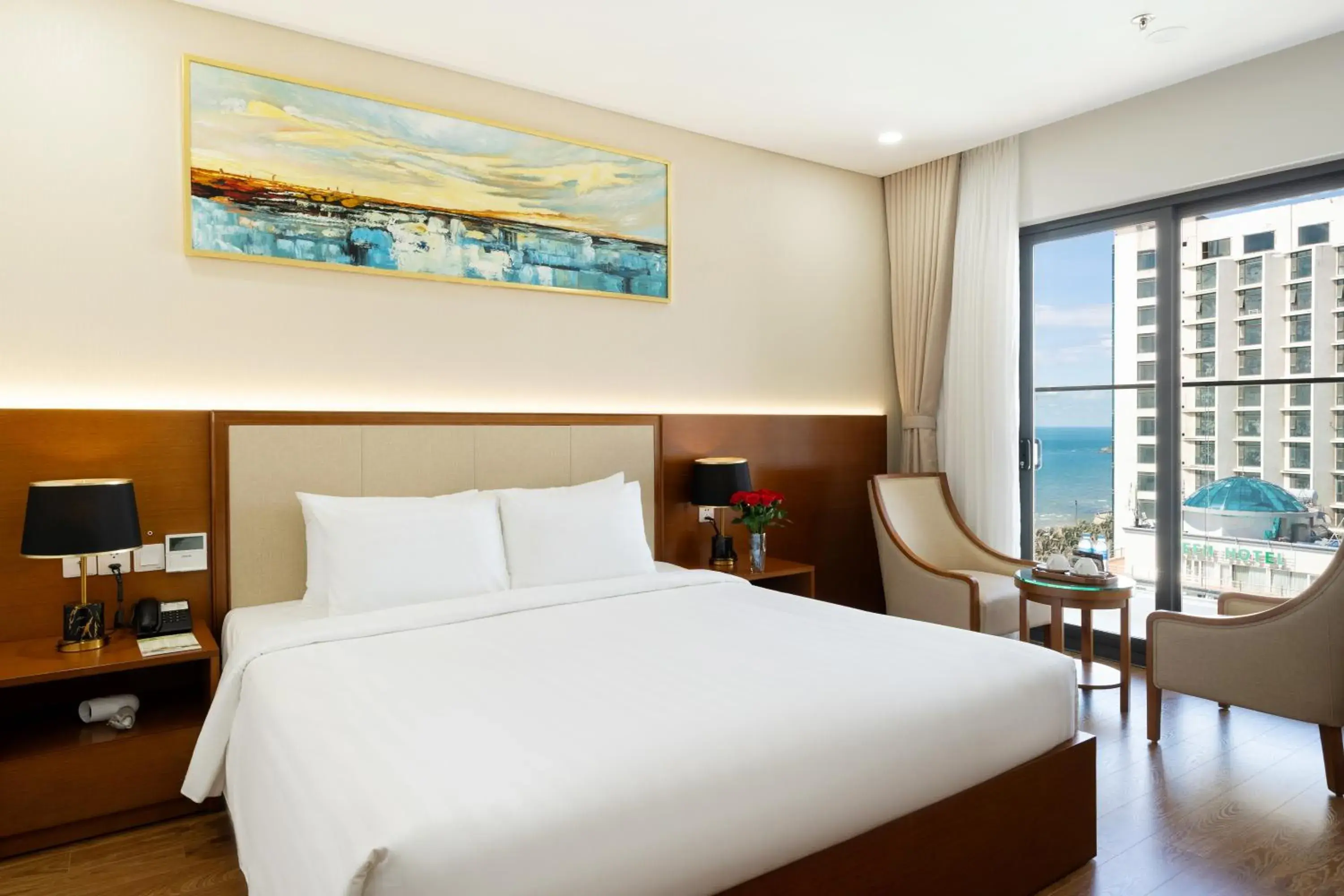 Deluxe Double Room with Balcony and Partial Sea View in Victory Hotel Vung Tau - New Wing Deluxe Double Room with Balcony and Partial Sea View in Victory Hotel Vung Tau - New Wing