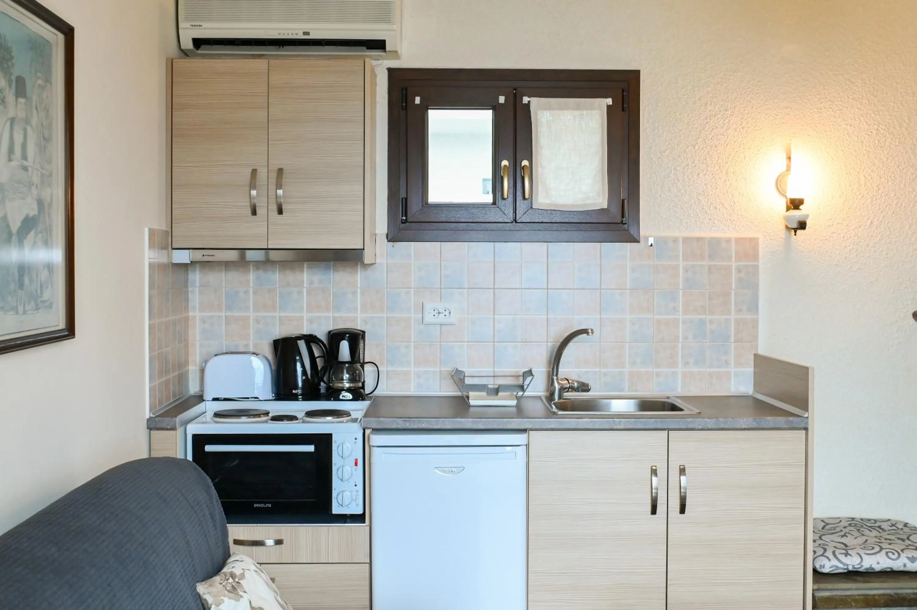 Kitchen or kitchenette in Agnanti Hotel Apartments