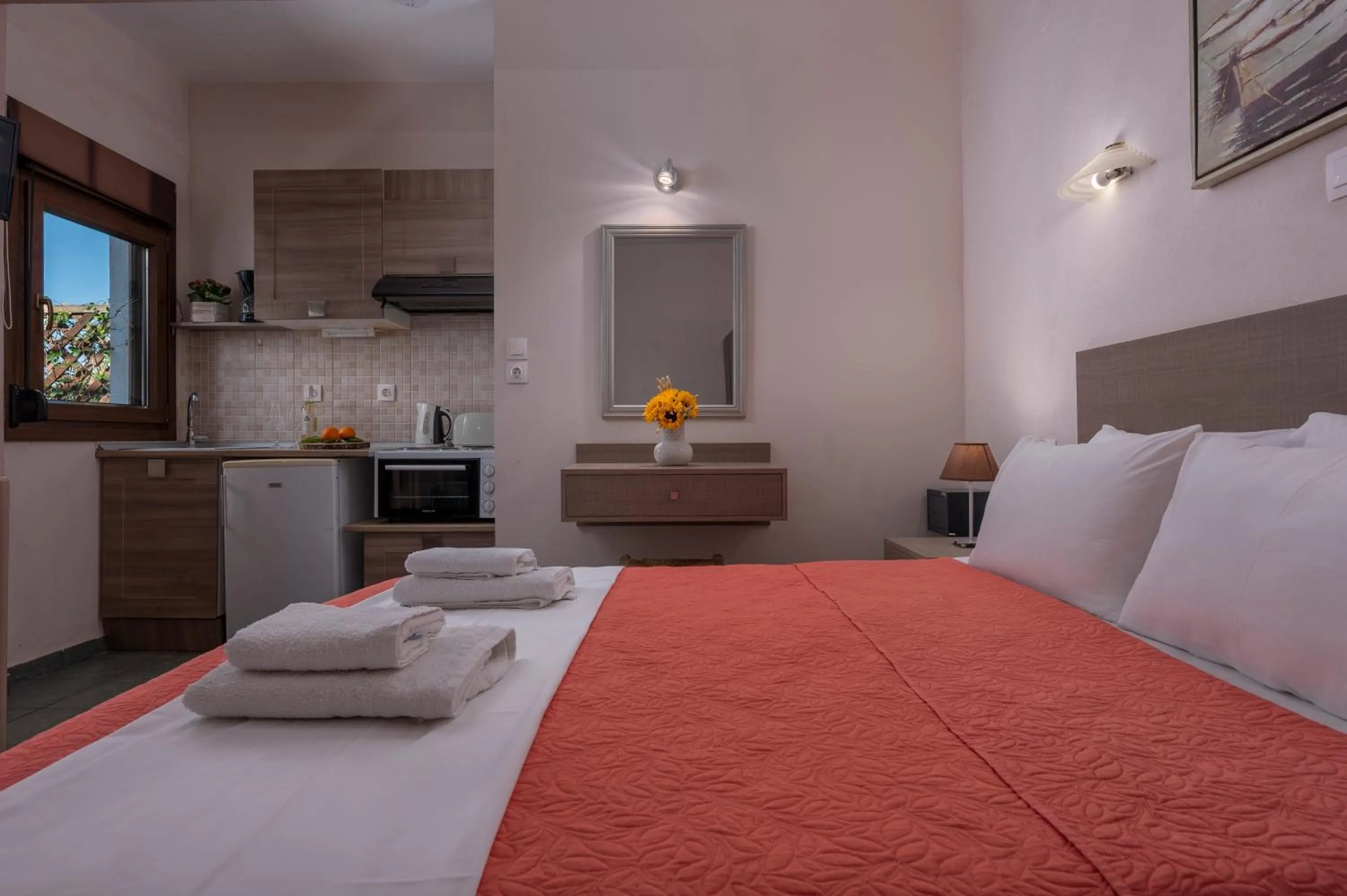 Kitchen or kitchenette, Bed in Agnanti Hotel Apartments