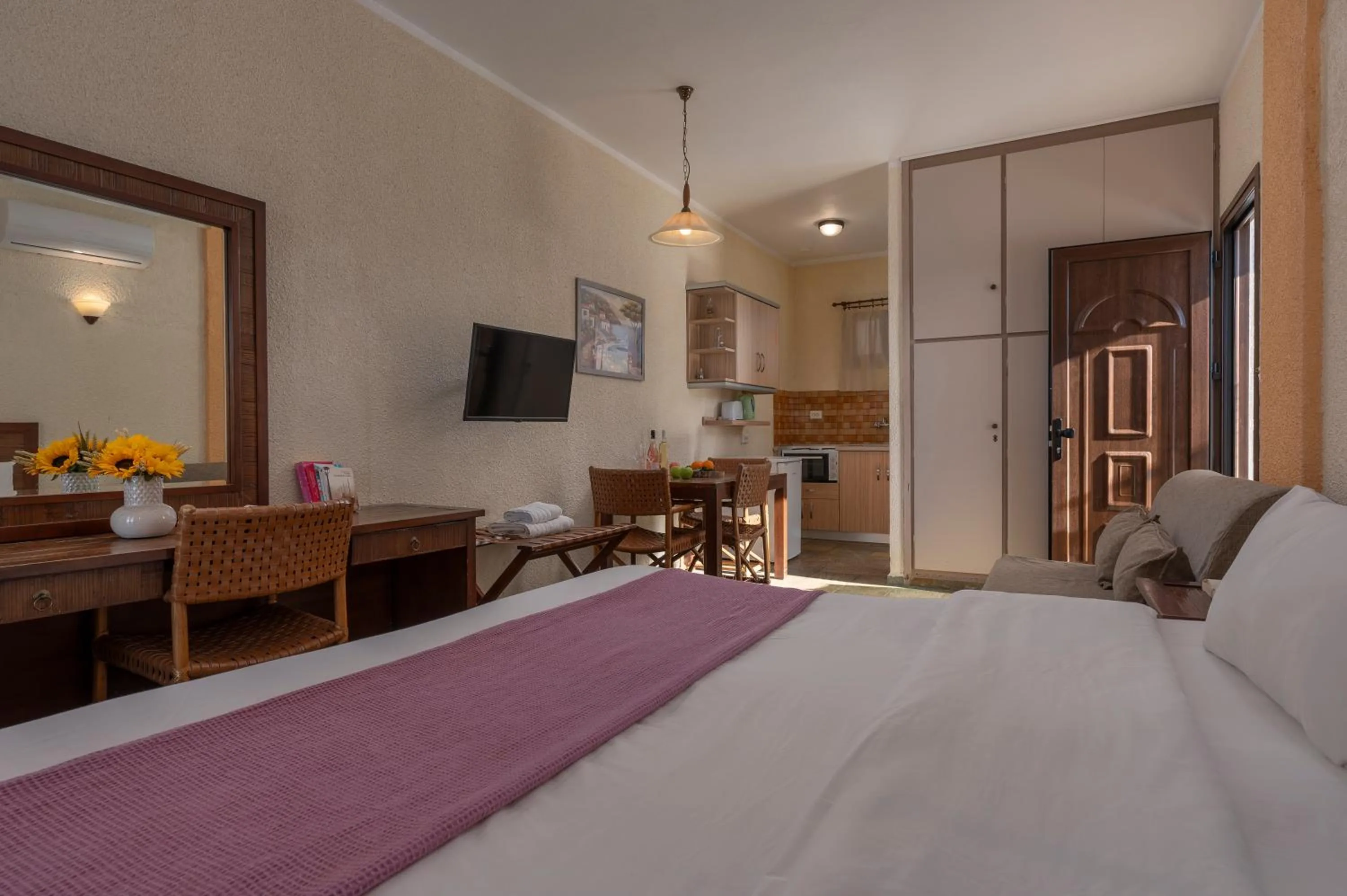 Bed in Agnanti Hotel Apartments