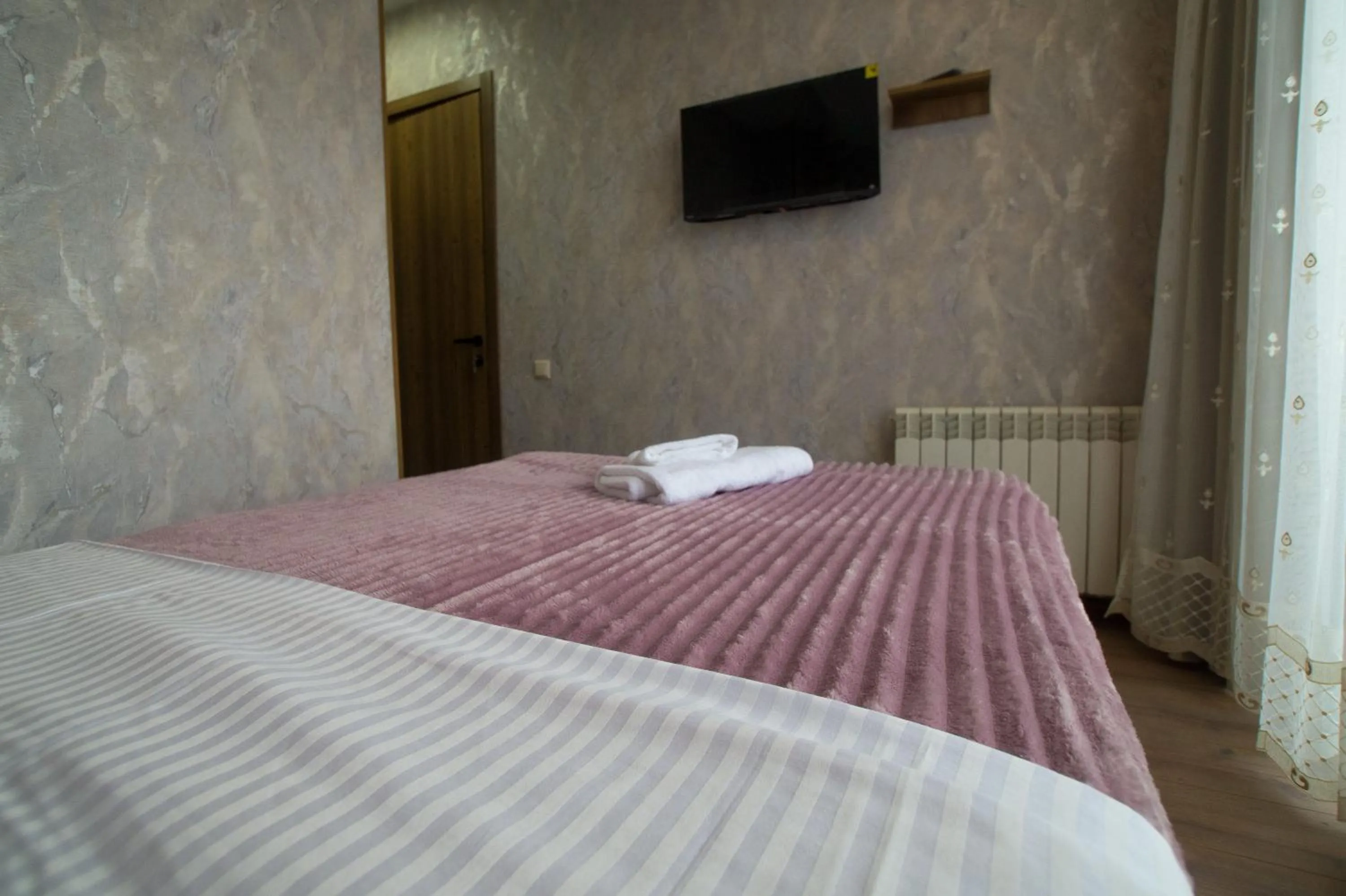 Bed in Prestige Guest House