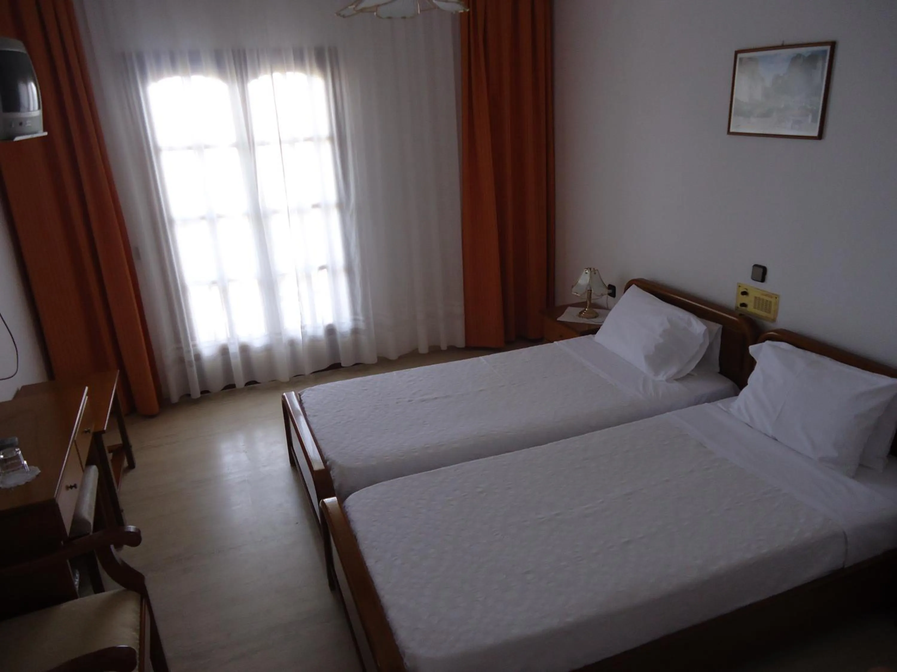 Bed in Hotel Paradise