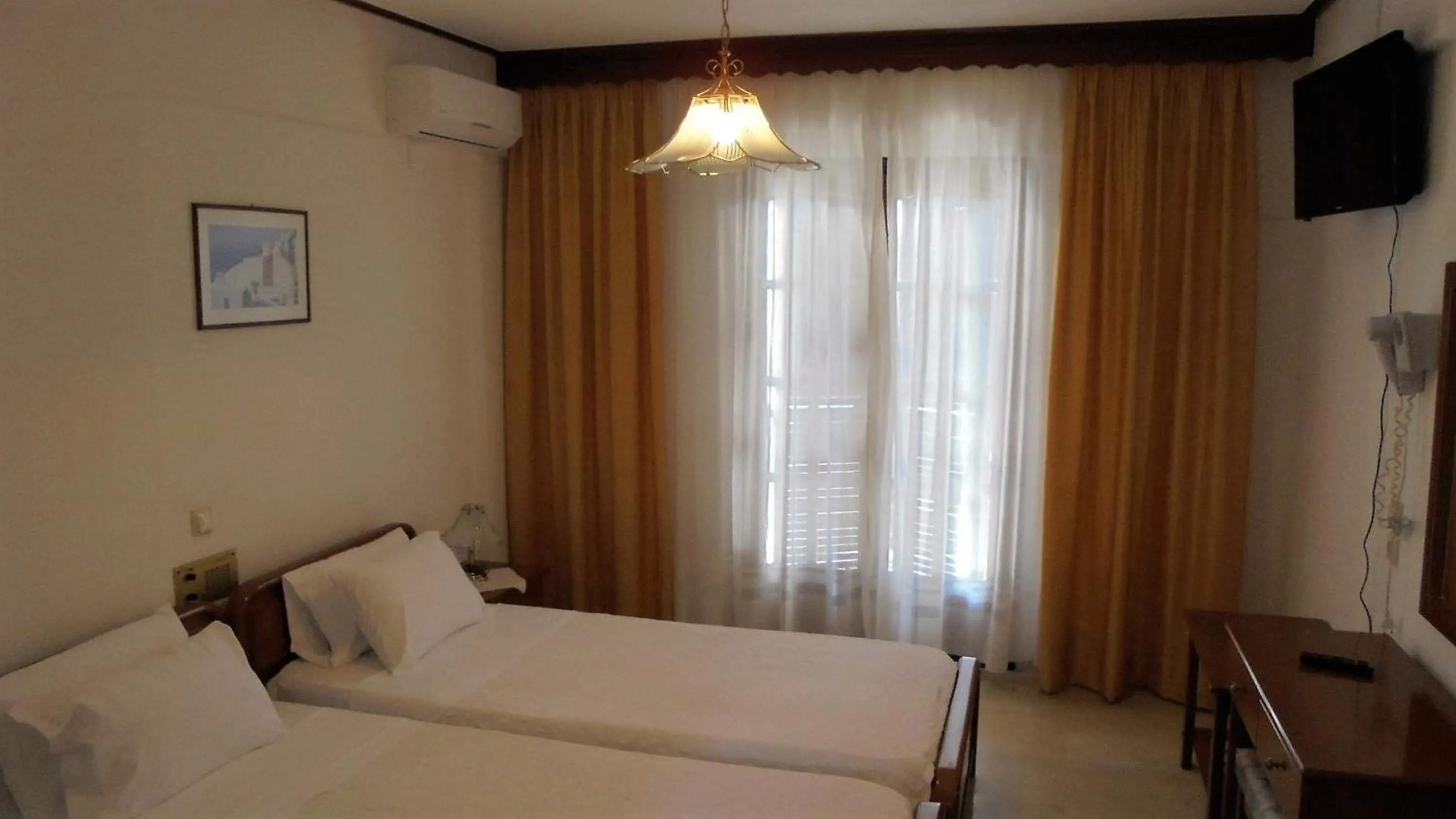 Bedroom in Hotel Paradise