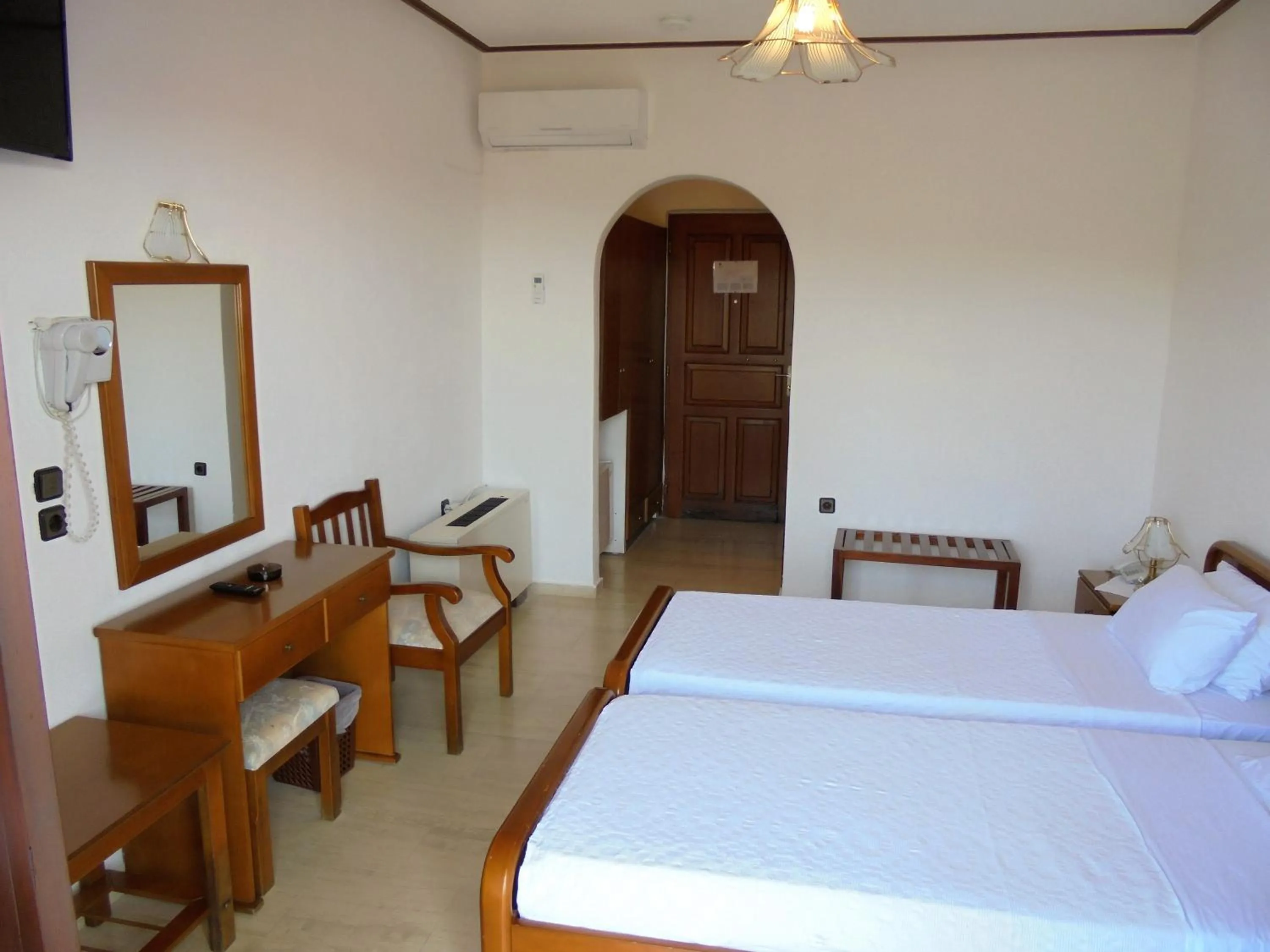 Bedroom in Hotel Paradise