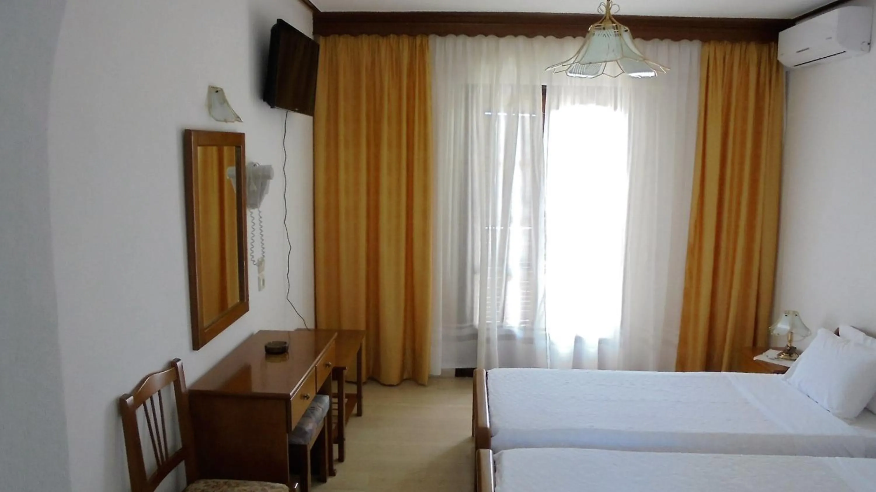 Bedroom in Hotel Paradise