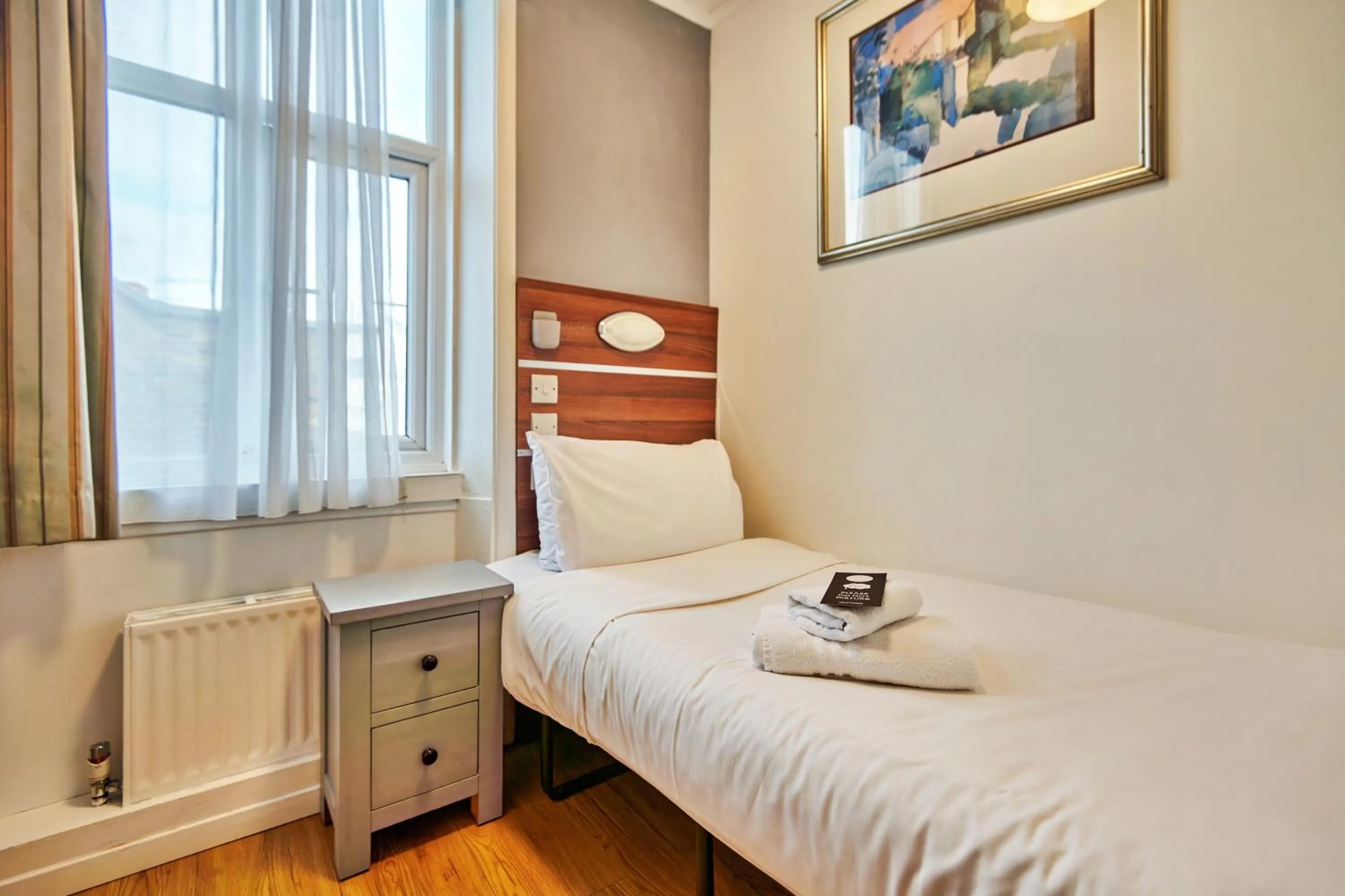 Bed in Huttons Hotel, Victoria London