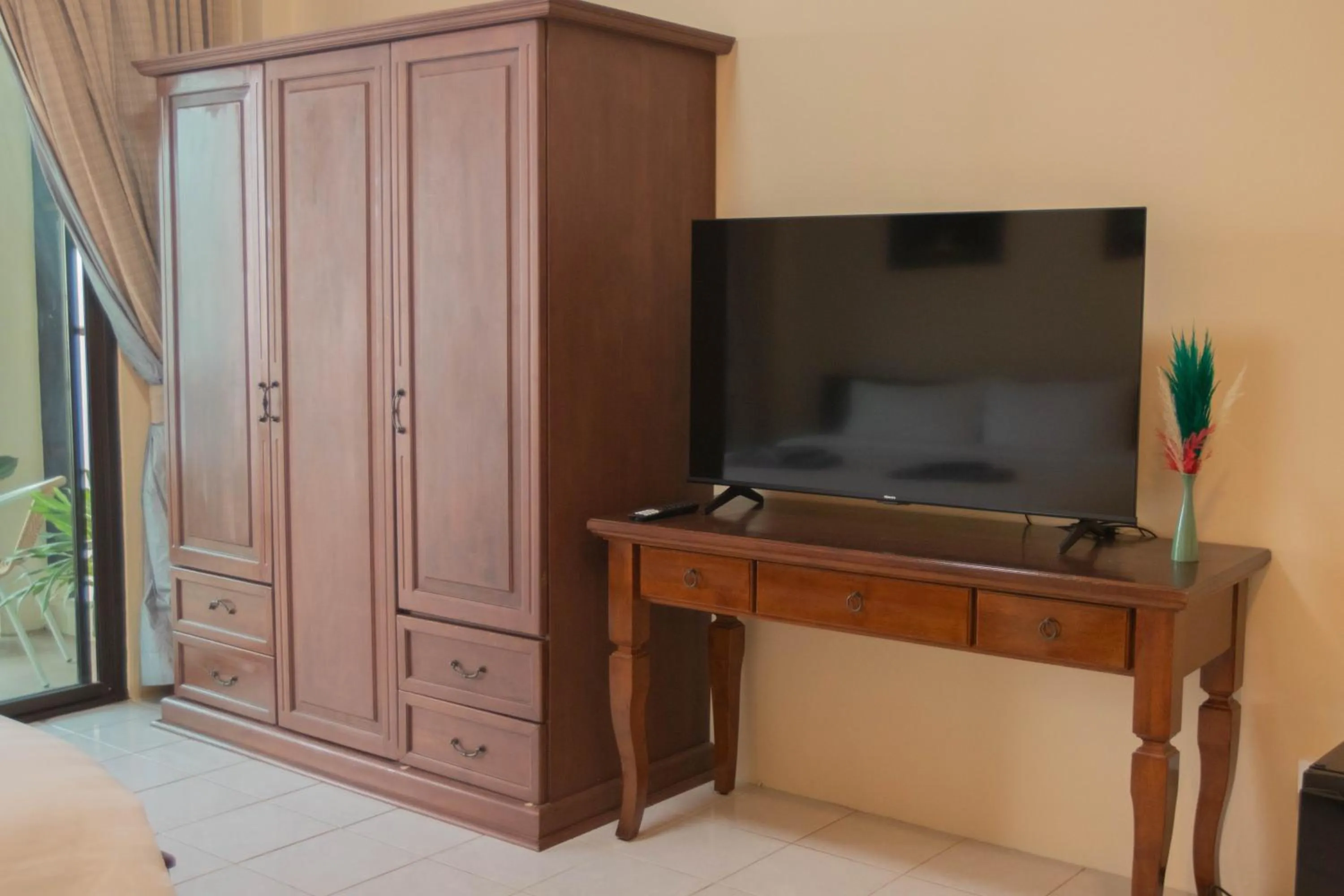 TV and multimedia in Maiiam Guesthouse Patong