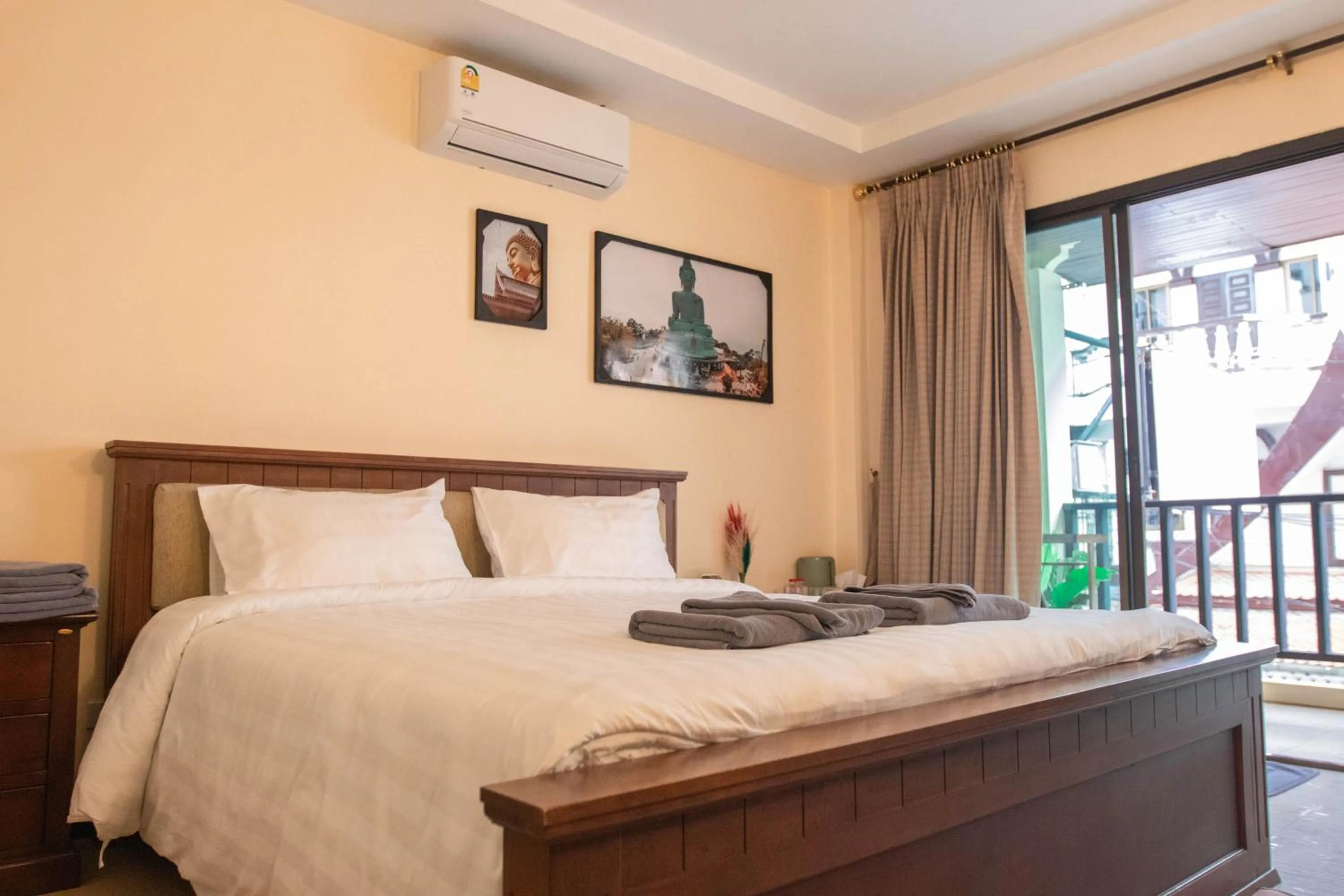 Bed in Maiiam Guesthouse Patong