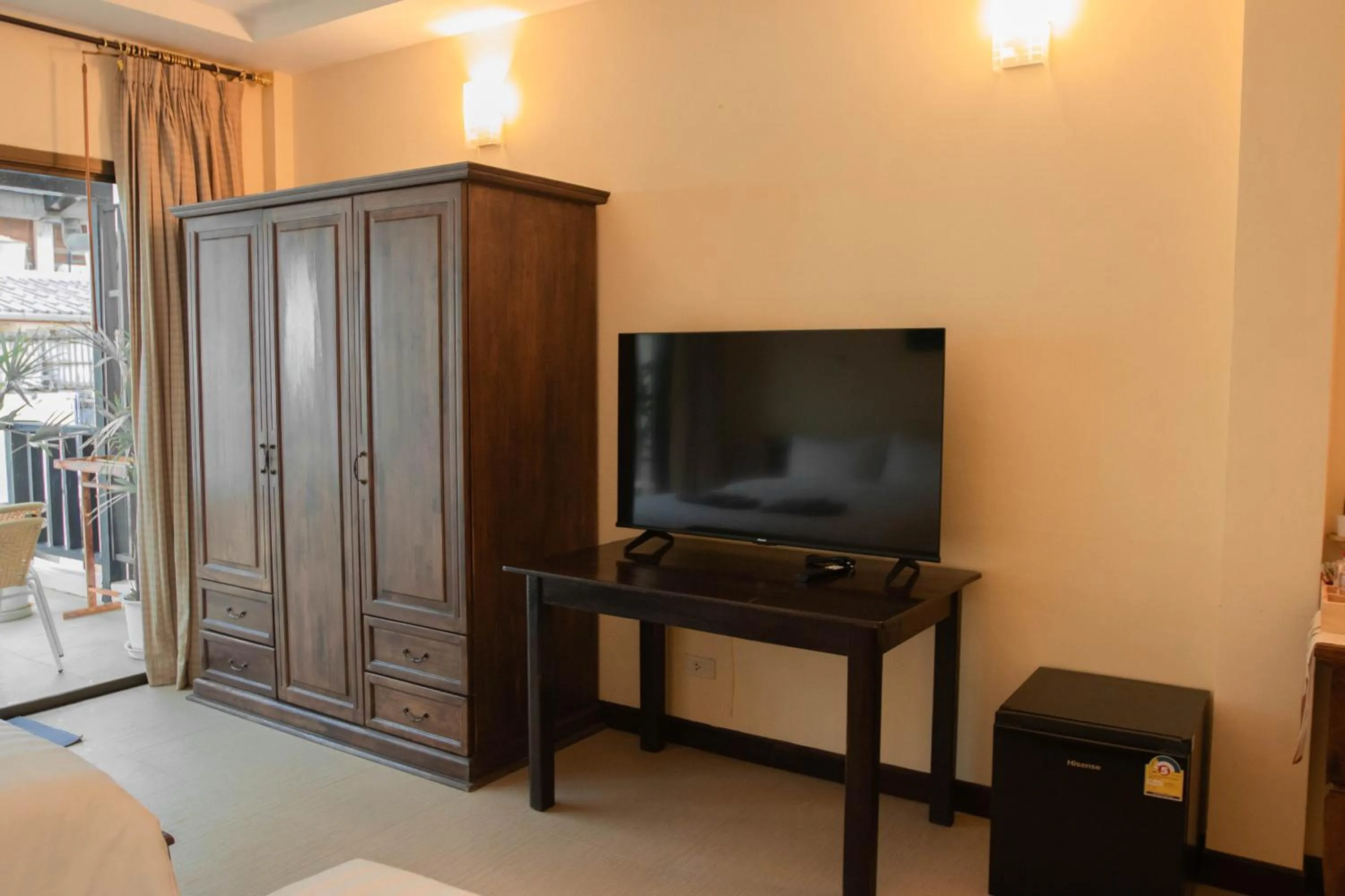 TV and multimedia in Maiiam Guesthouse Patong