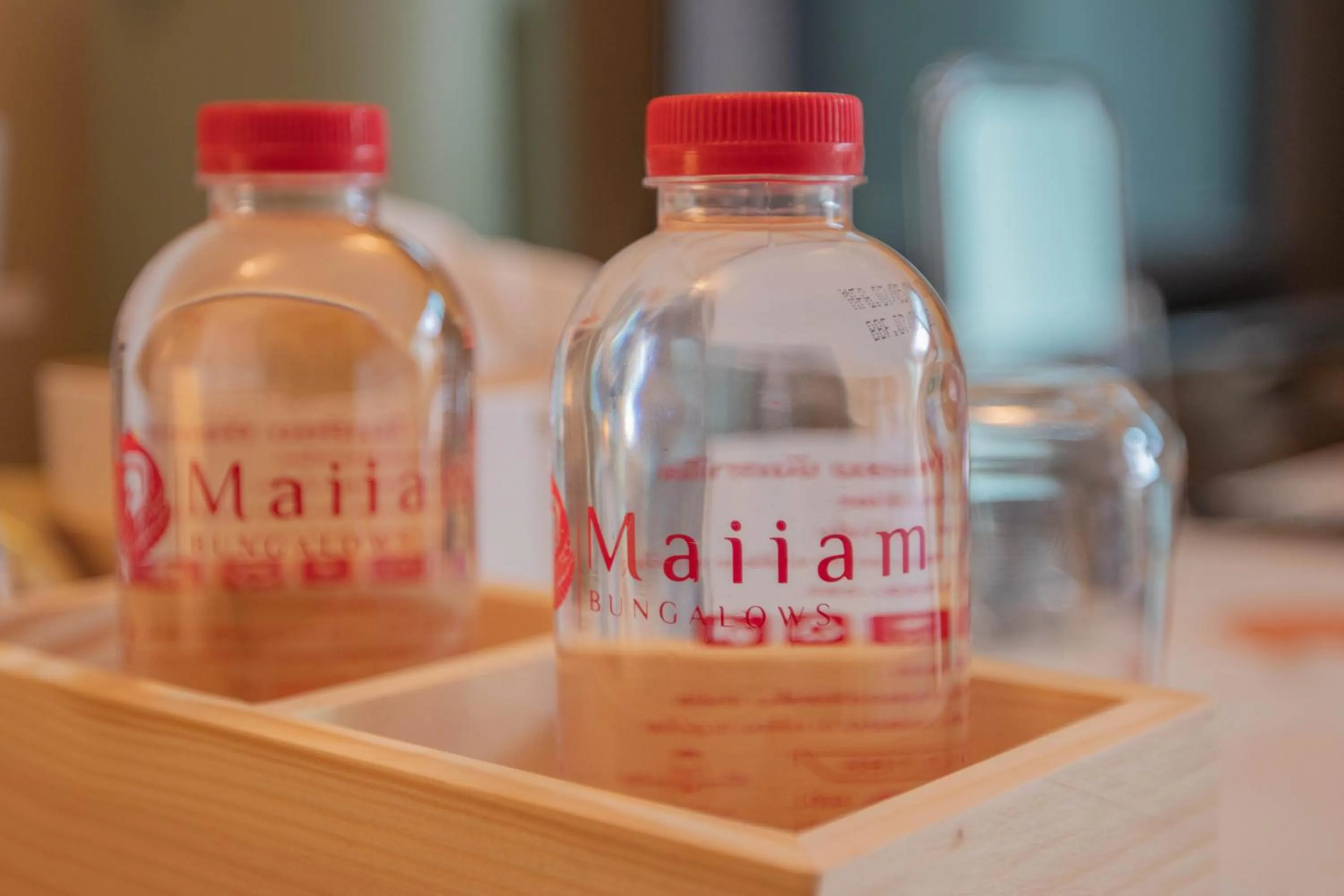 Text overlay in Maiiam Guesthouse Patong