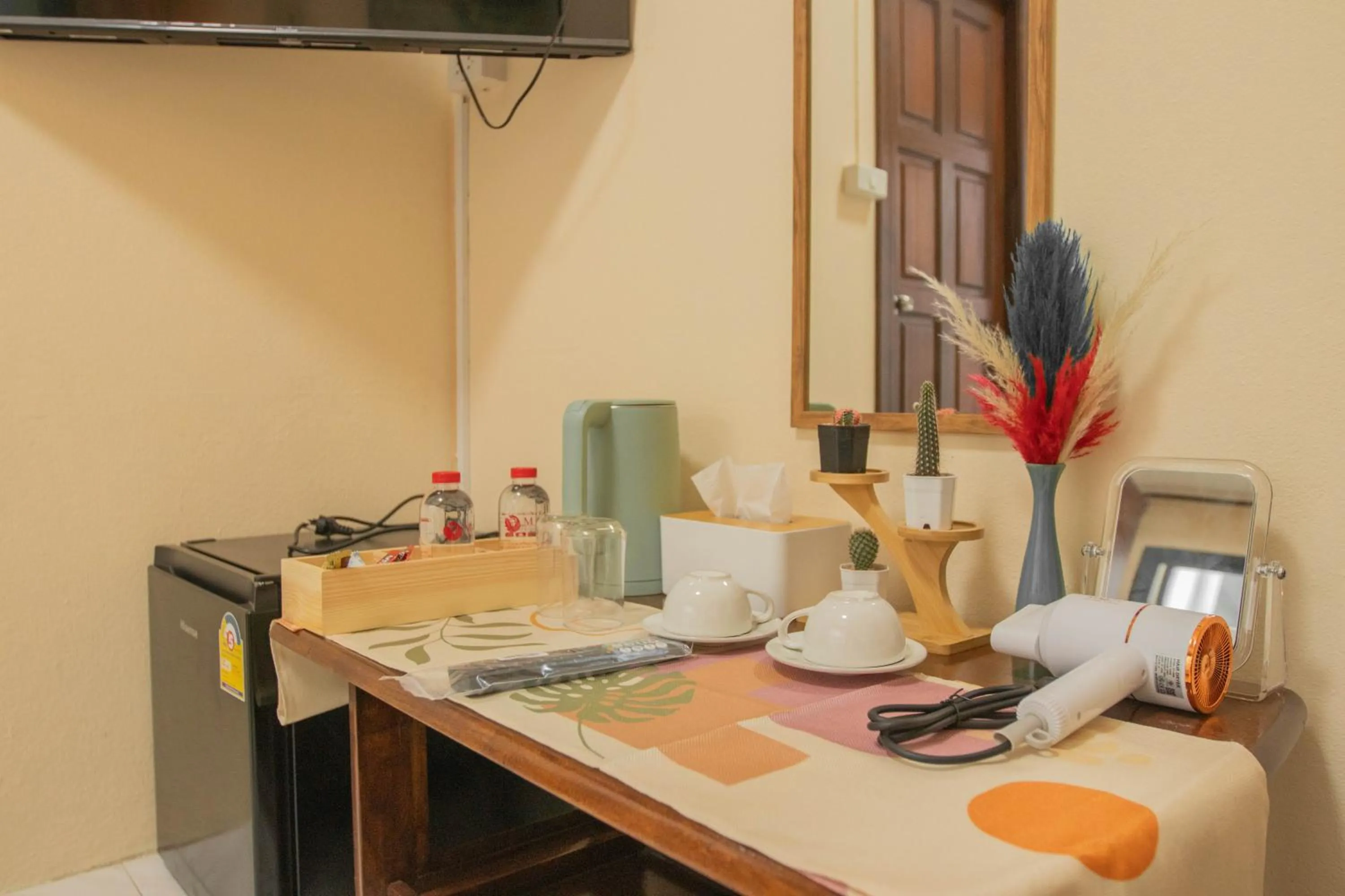 Kitchen or kitchenette in Maiiam Guesthouse Patong