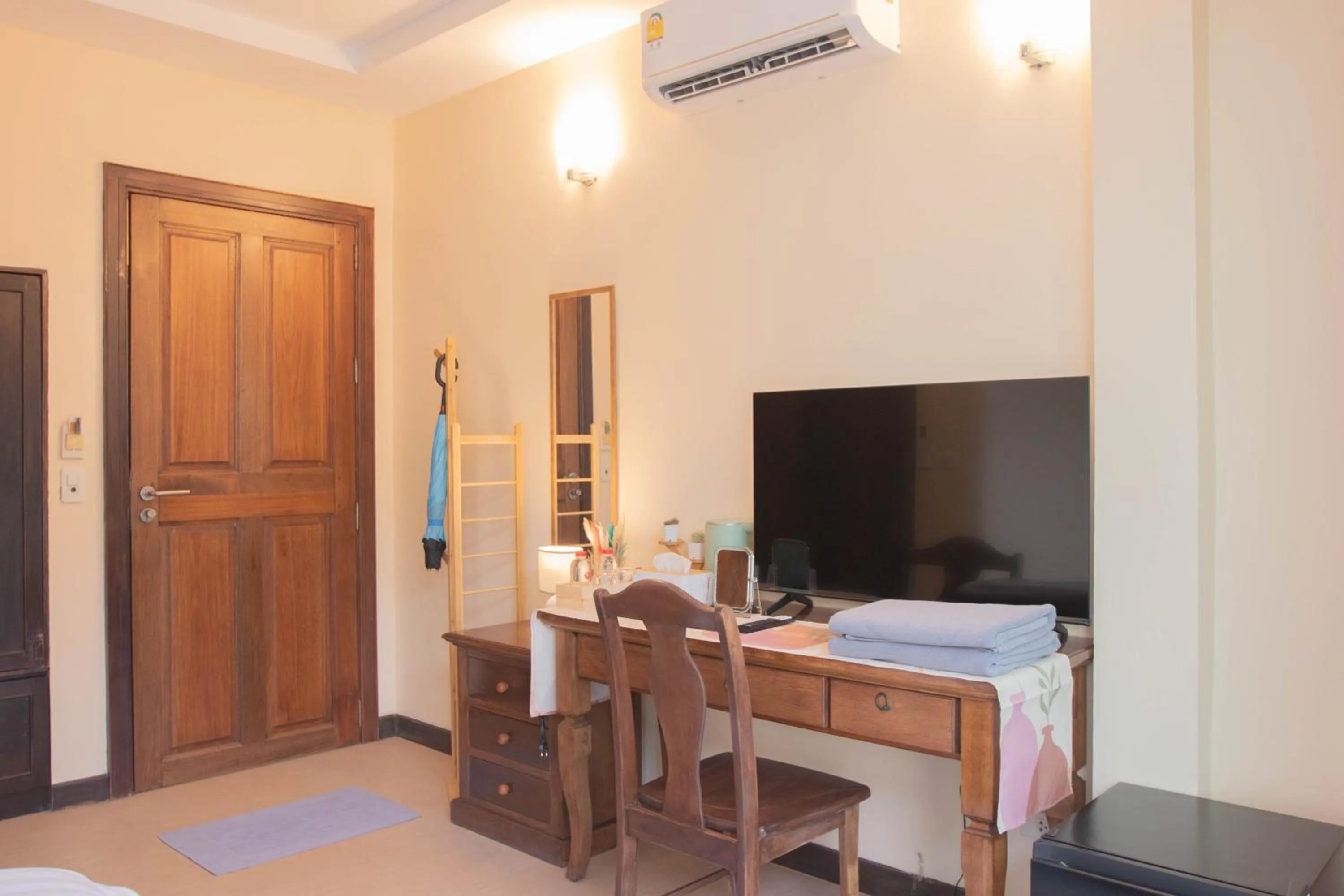 TV and multimedia in Maiiam Guesthouse Patong