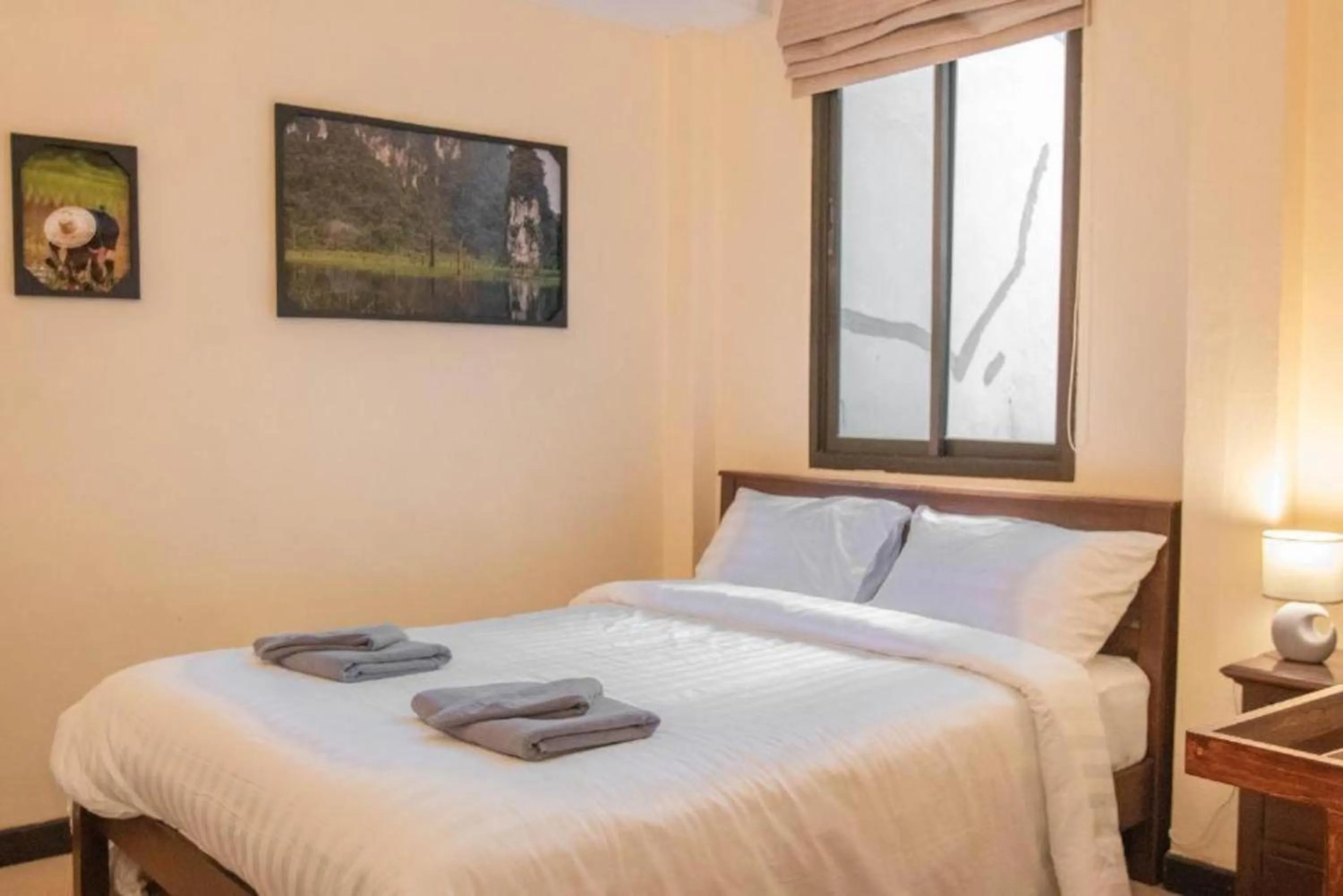 Bed in Maiiam Guesthouse Patong