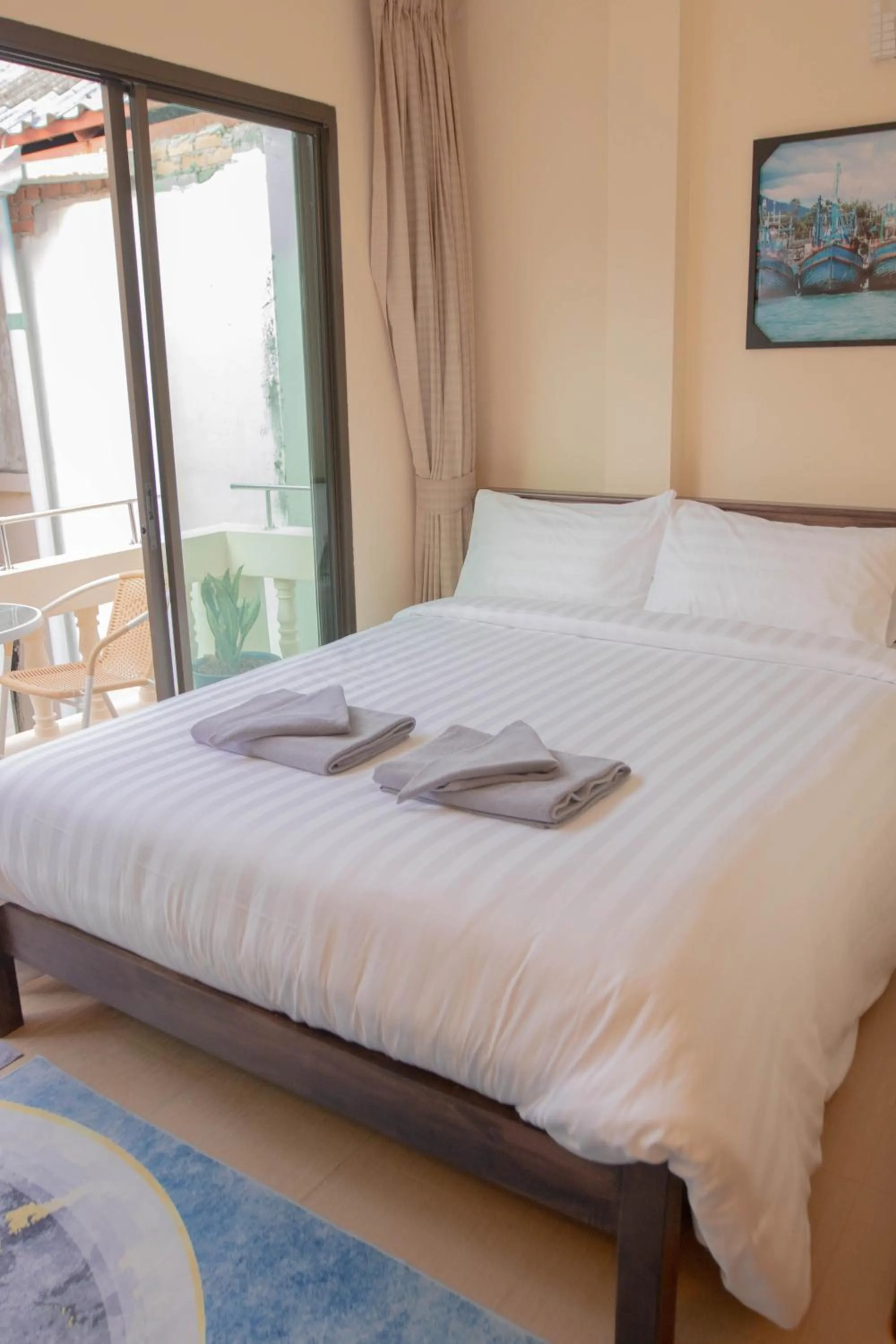 Bed in Maiiam Guesthouse Patong