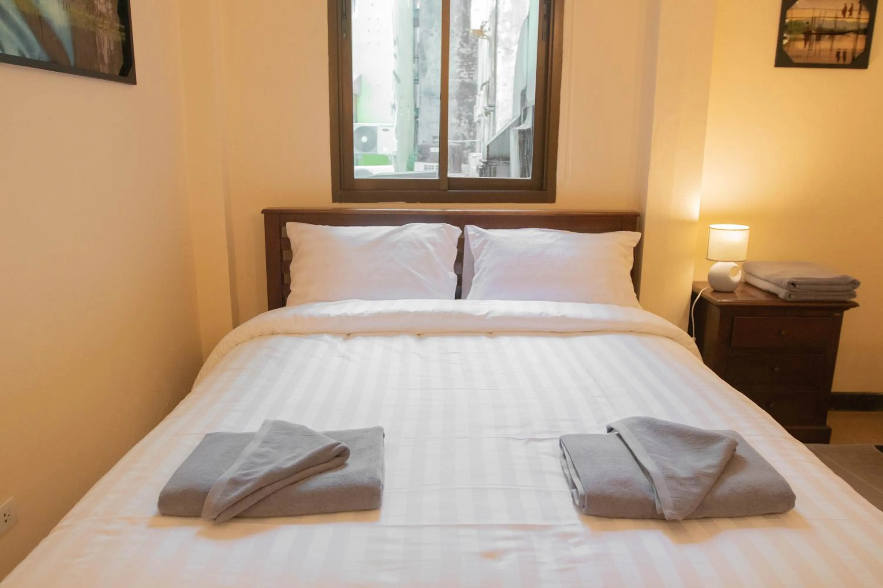 Bed in Maiiam Guesthouse Patong