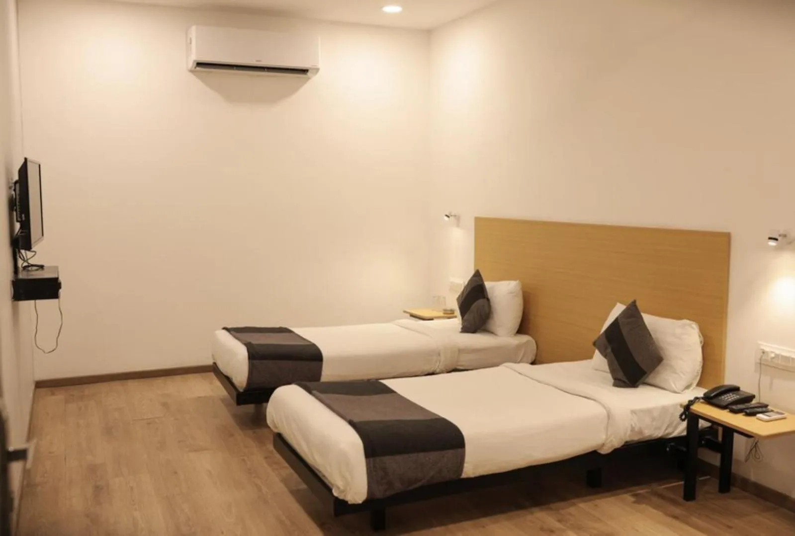 Photo of the whole room, Bed in Hotel Signature, Nagpur