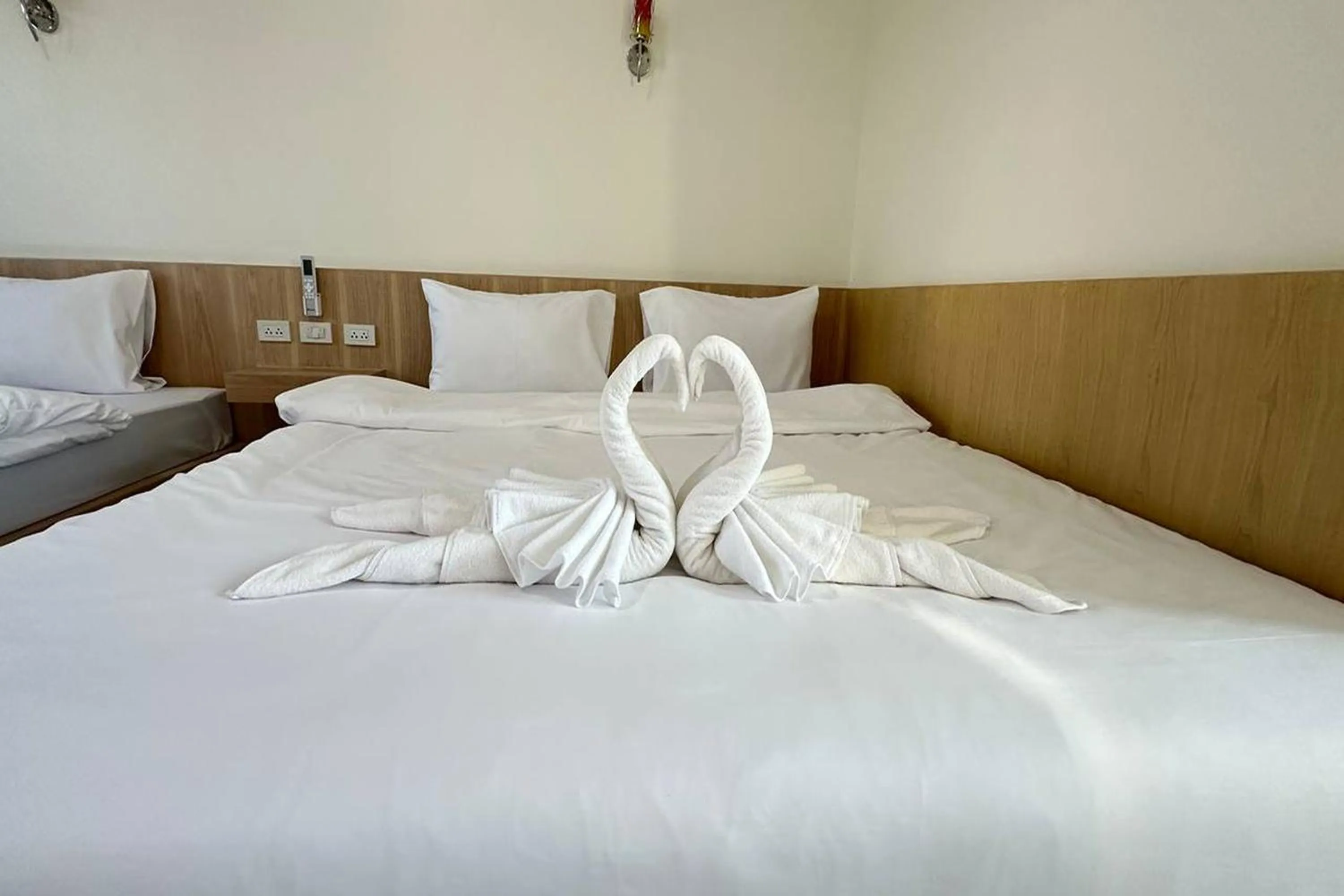 Bed in The White House P&N Hotel Chiang Rai