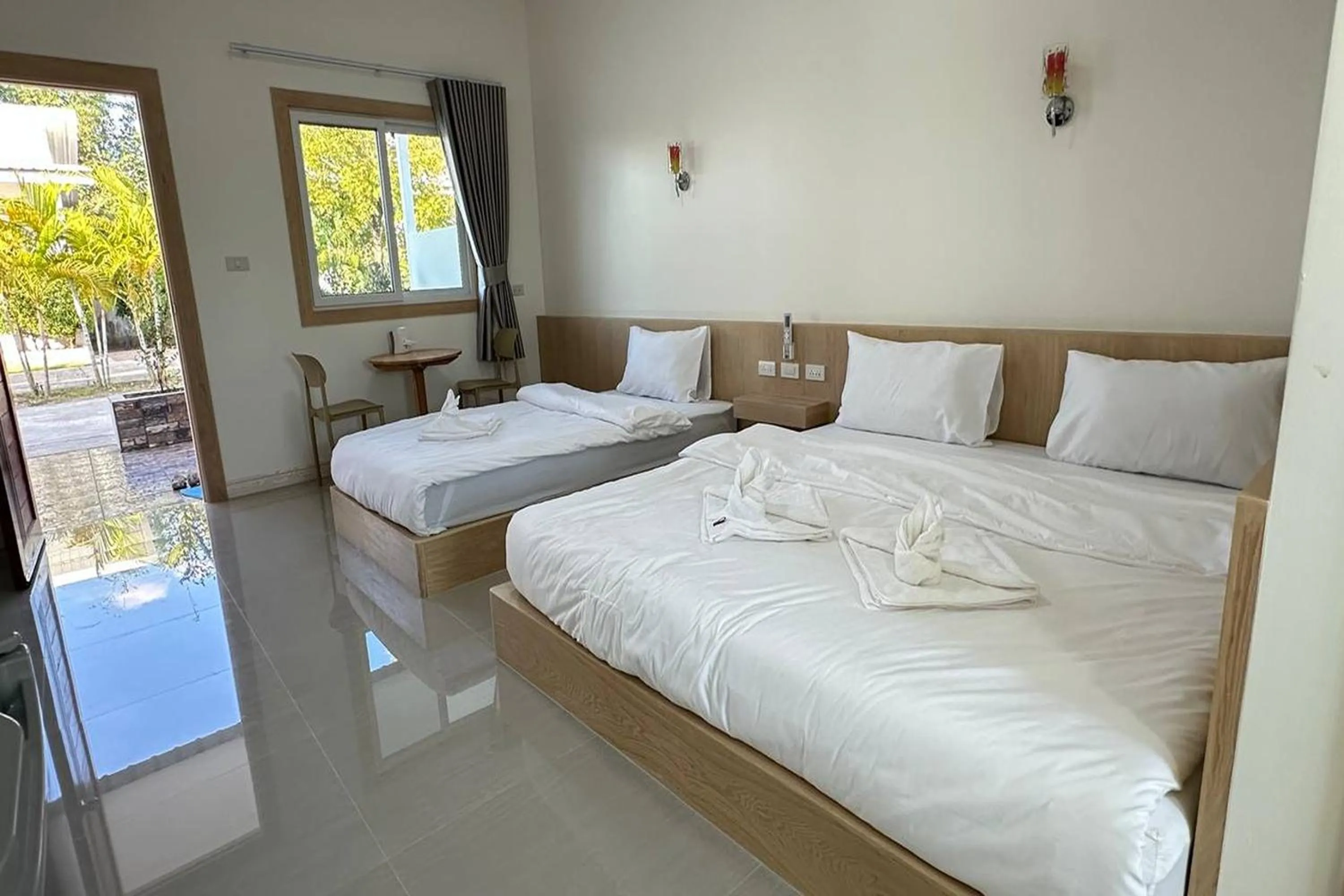 Bed in The White House P&N Hotel Chiang Rai