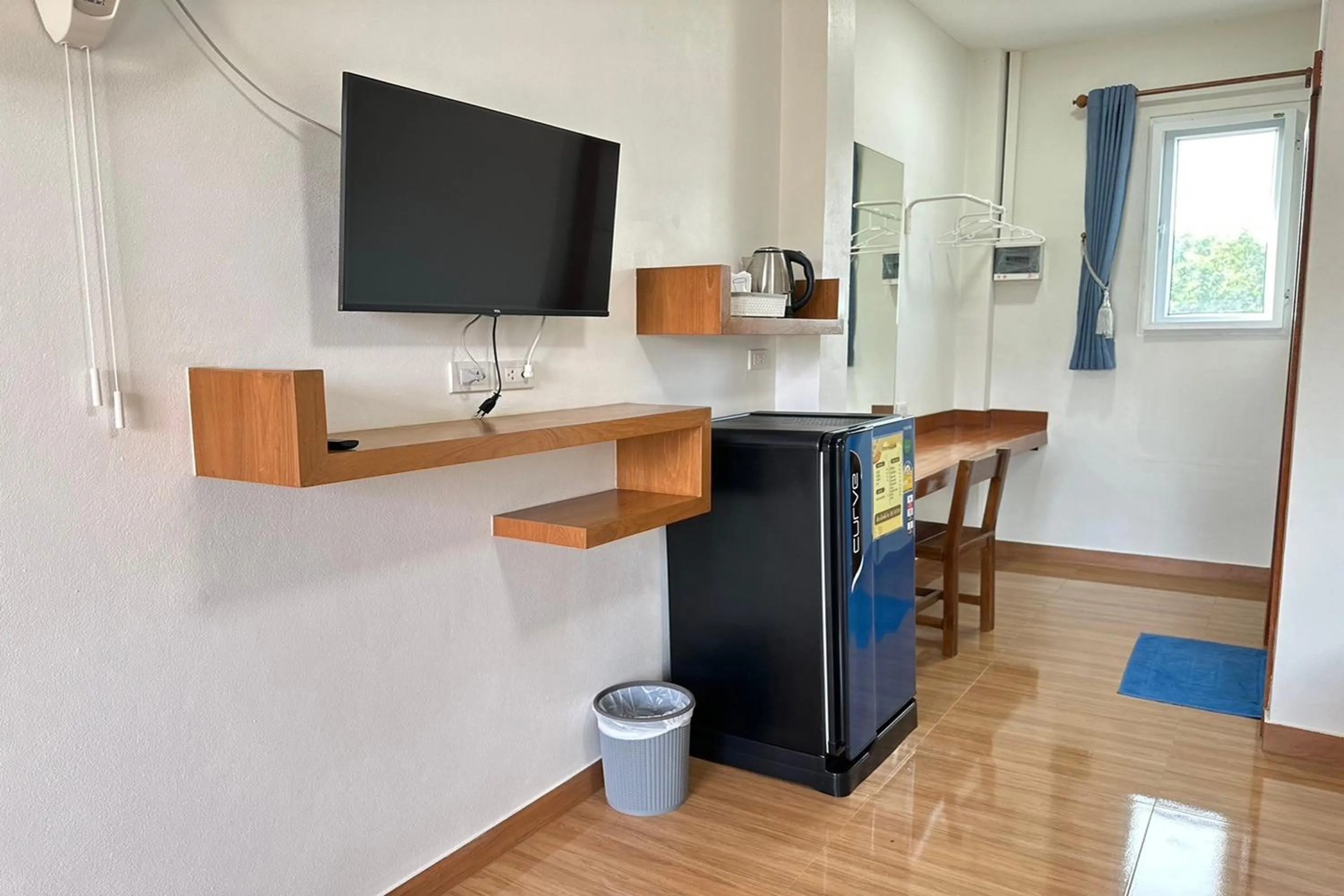 TV and multimedia in The White House P&N Hotel Chiang Rai