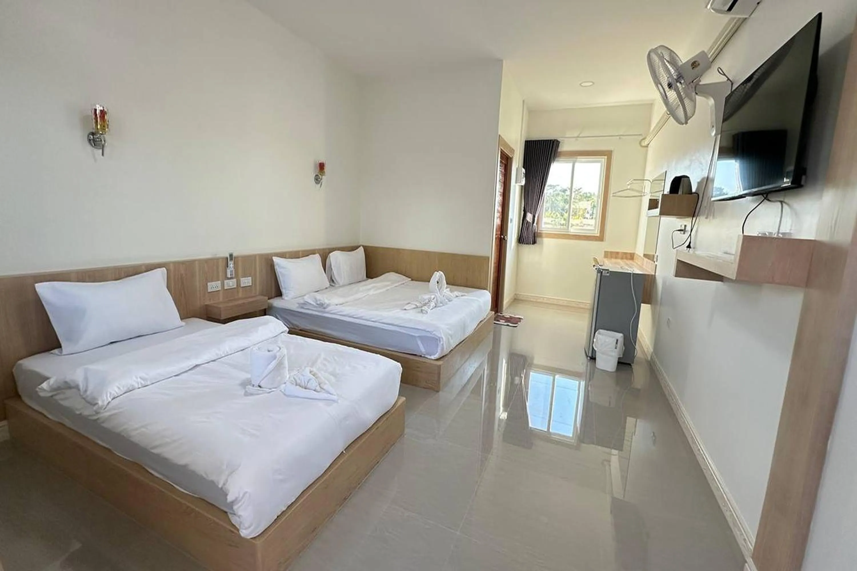 Bed in The White House P&N Hotel Chiang Rai