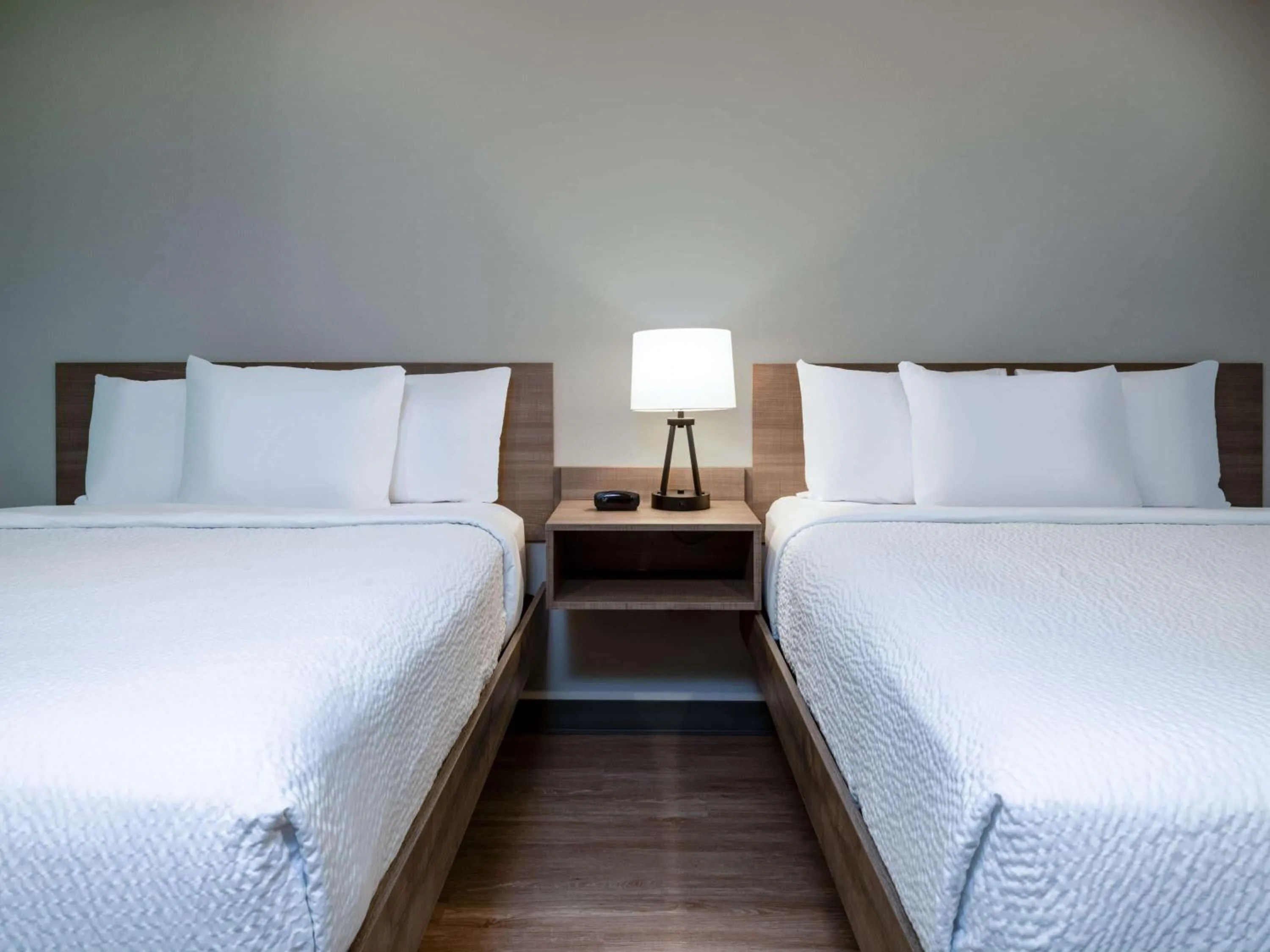 Photo of the whole room, Bed in ECHO Suites Extended Stay by Wyndham Spartanburg