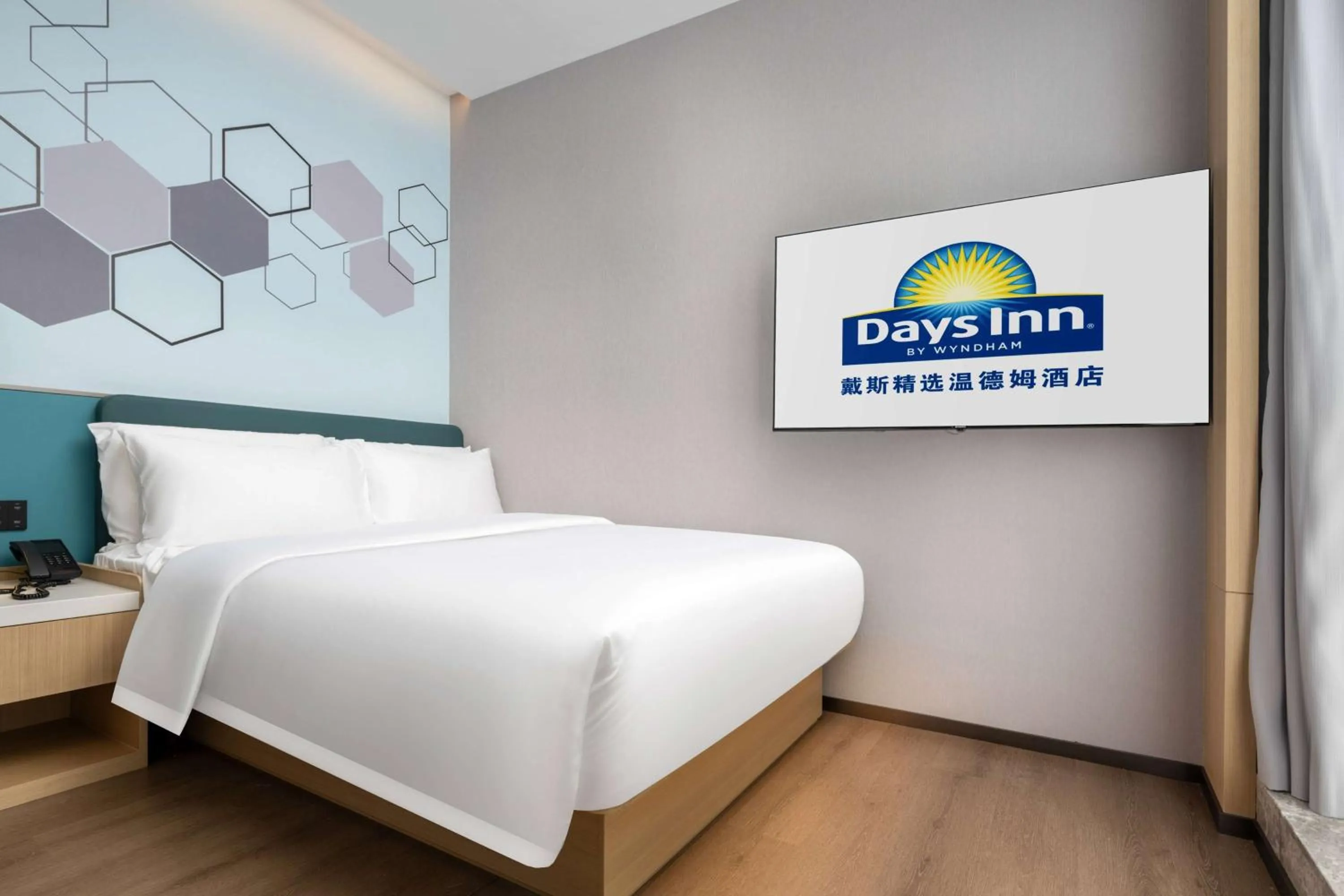Photo of the whole room, Bed in Days Inn by Wyndham Zhuhai Gongbei Port