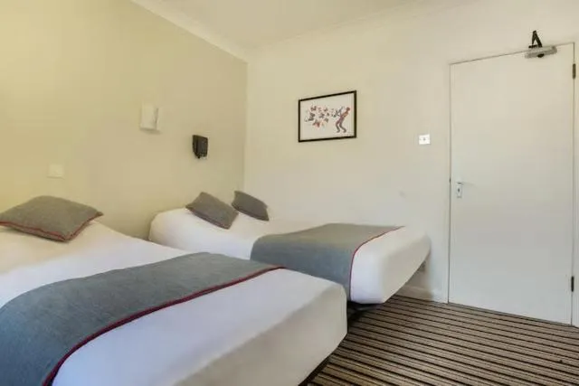 Bedroom, Bed in Enrico Hotel