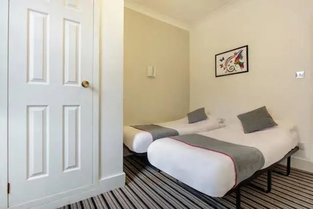 Bedroom, Bed in Enrico Hotel