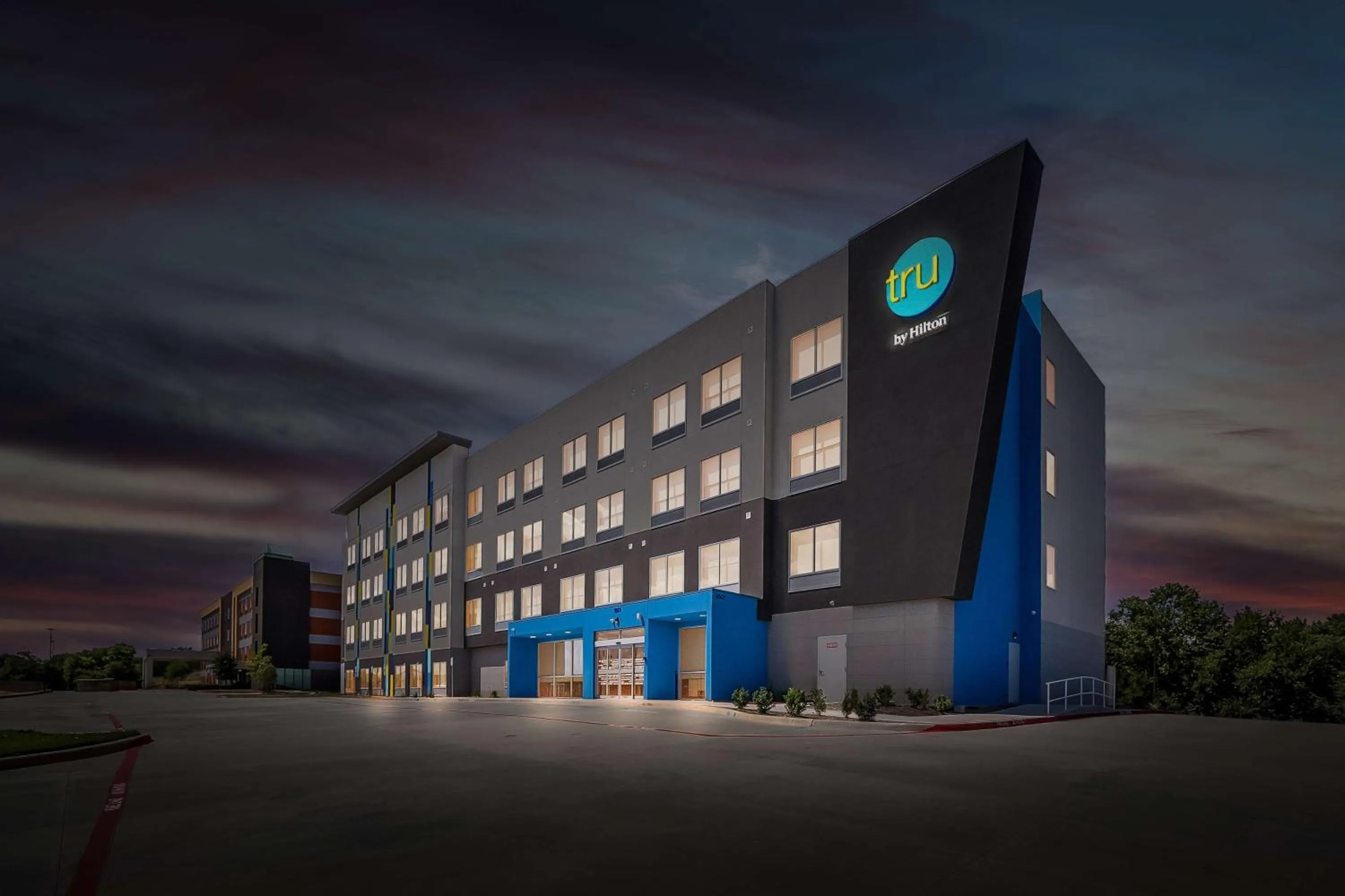 Property building in Tru by Hilton Plano Hwy 75