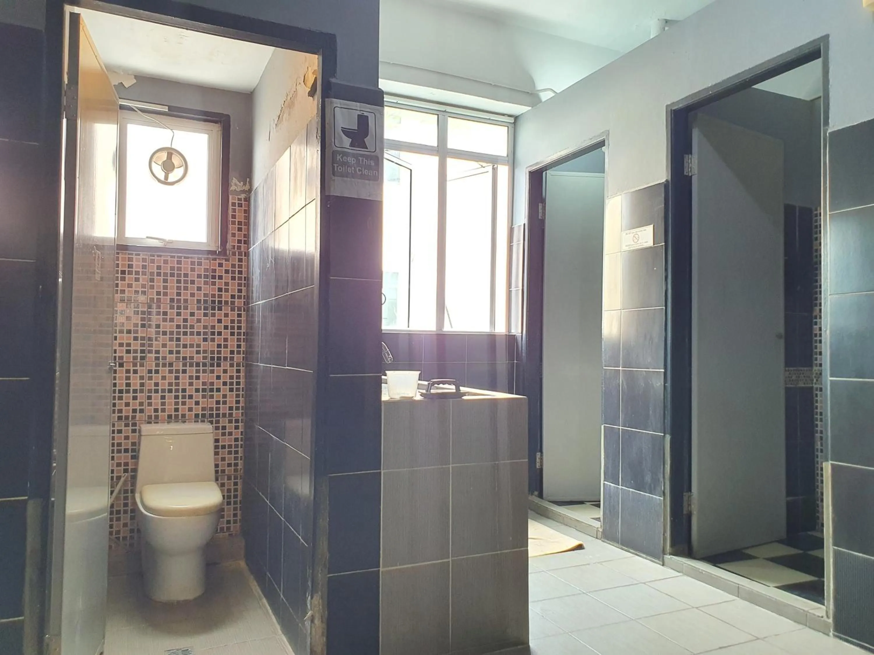 Bathroom in SPOT ON 90984 Gn Homestay