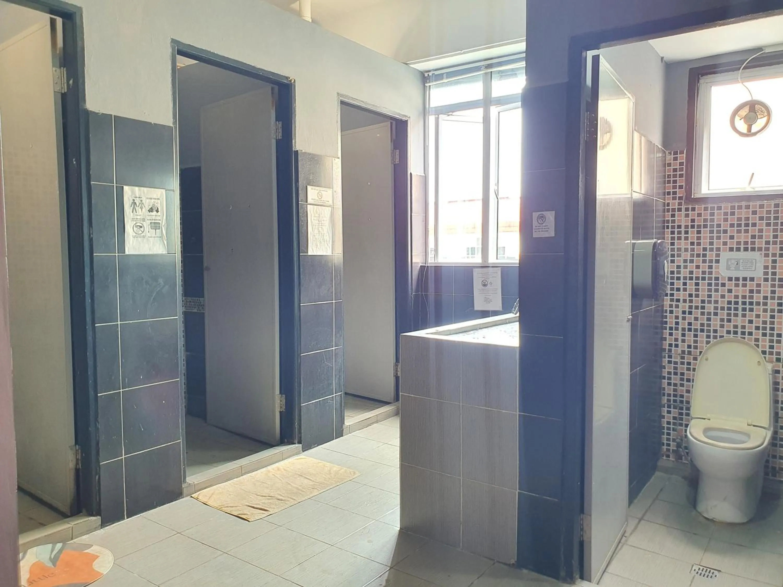 Bathroom in SPOT ON 90984 Gn Homestay