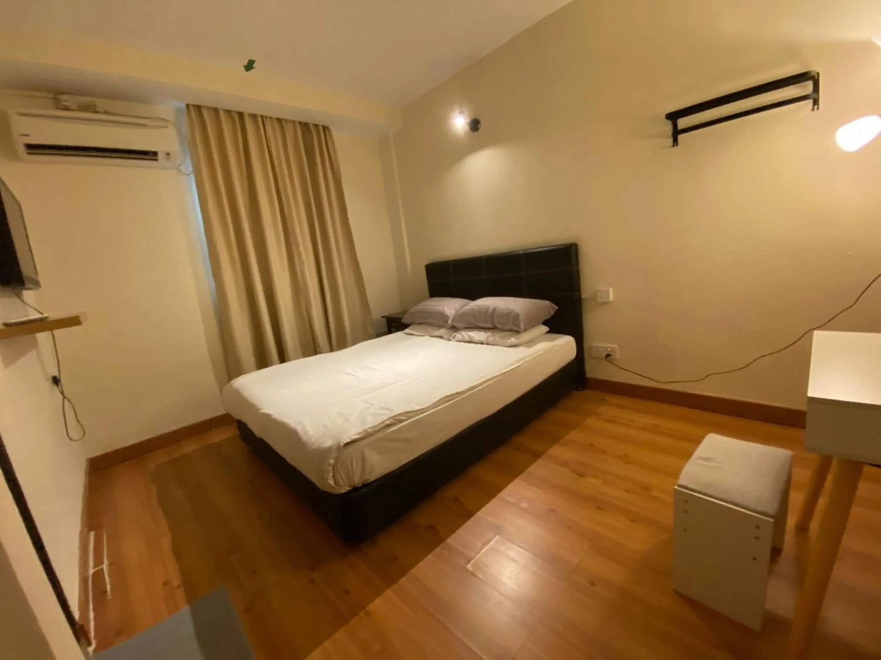 Bedroom in SPOT ON 90984 Gn Homestay