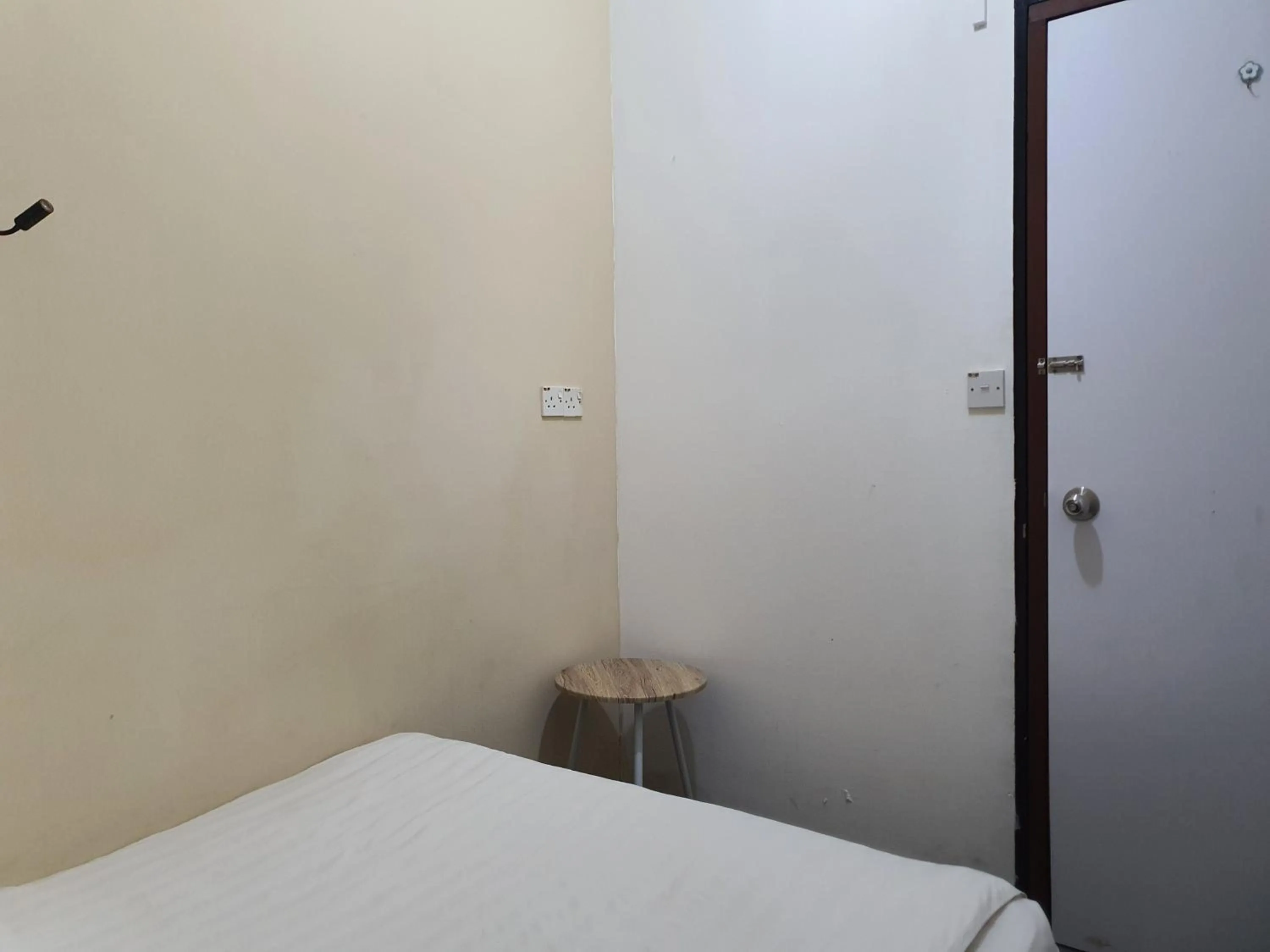 Bedroom in SPOT ON 90984 Gn Homestay