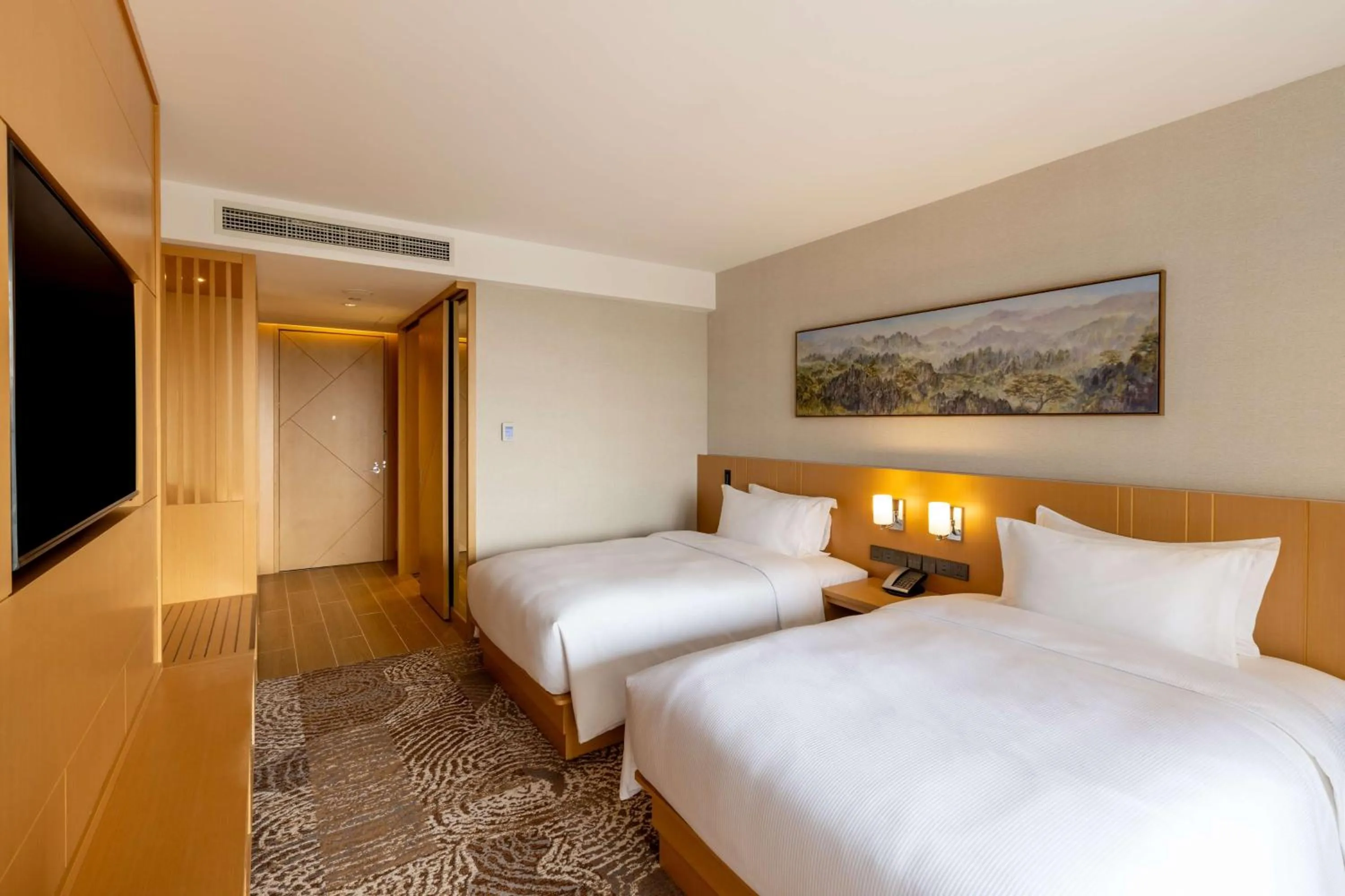 Bed in DoubleTree by Hilton Vientiane