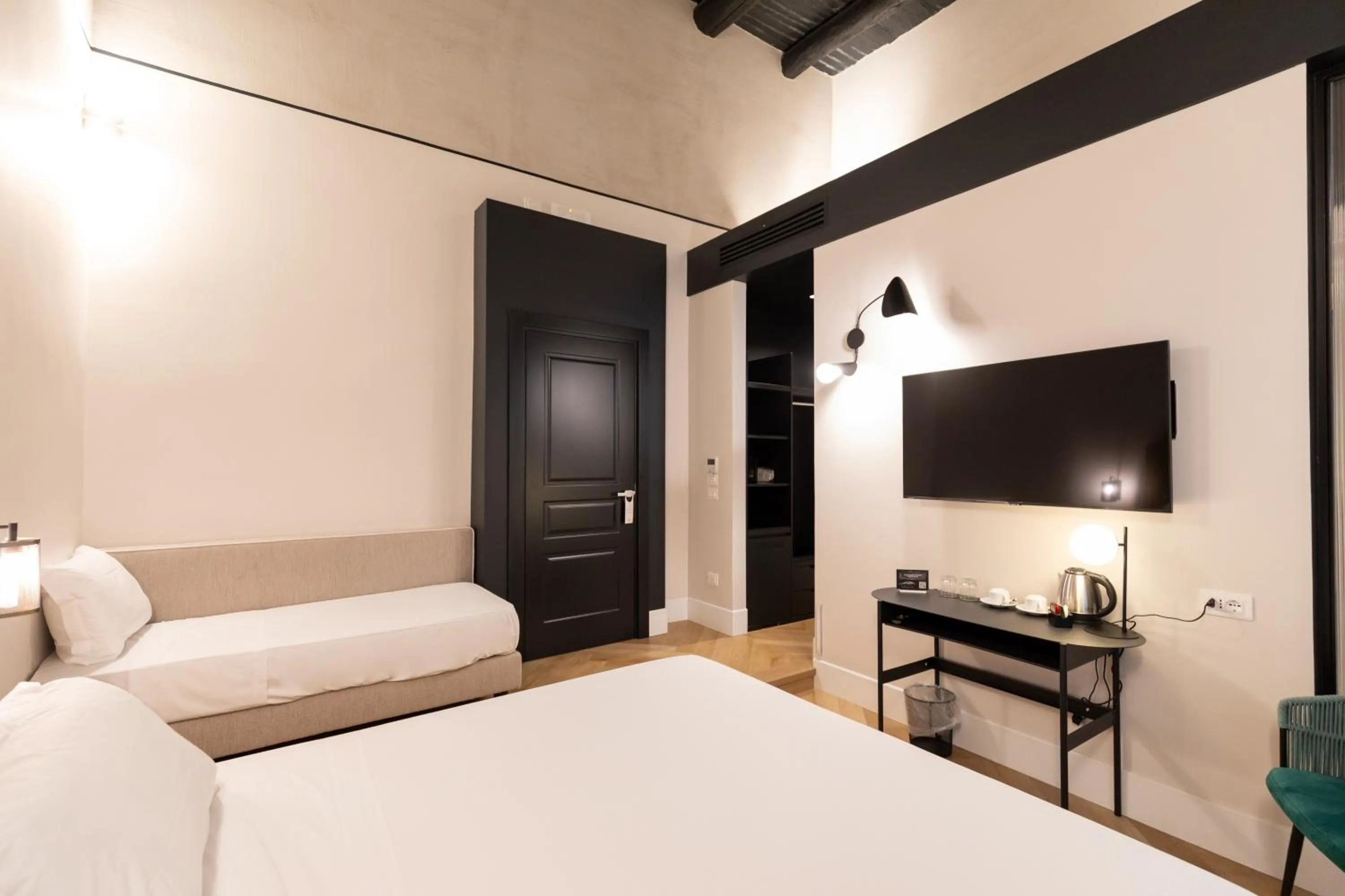 Living room, Bed in Relais Ammira